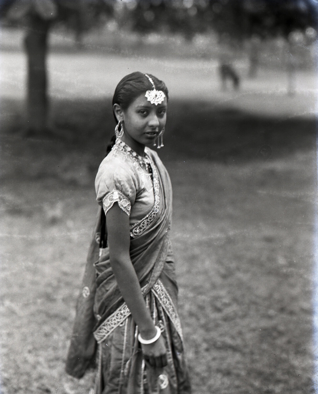 Portrait of a Young Woman in Traditional Sari and Jewelry, India, WWII Era