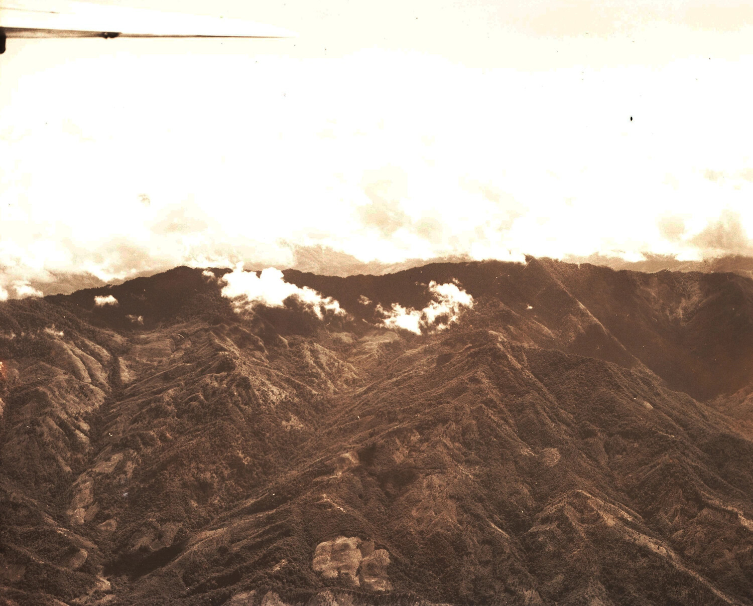 Aerial View of Mountainous Terrain from Liaison Aircraft, China-Burma-India Theater, WWII (L-5 Collection)