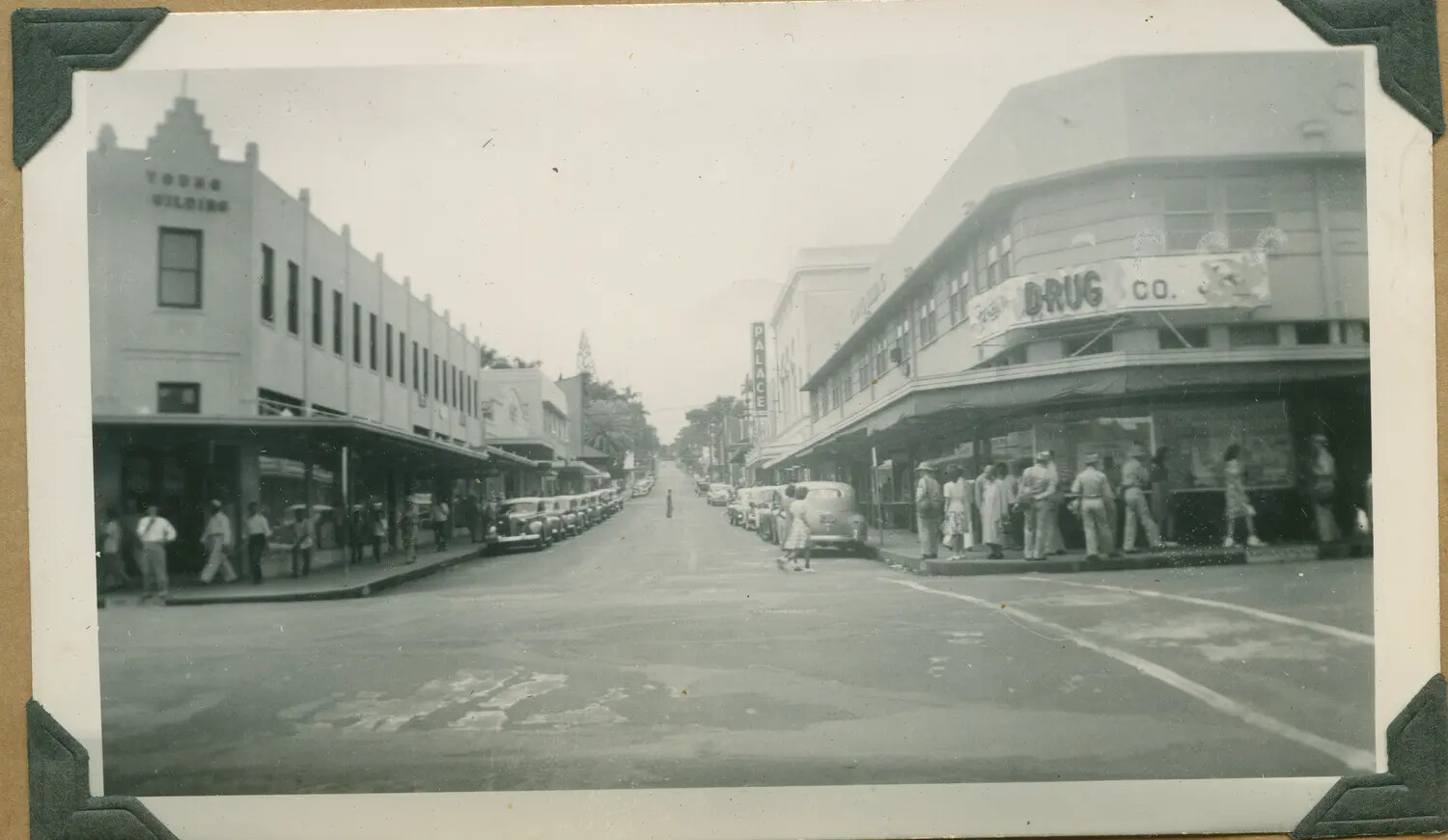 Downtown Hilo Street Corner with Young Building and Drug Co., Hawaii, WWII Era