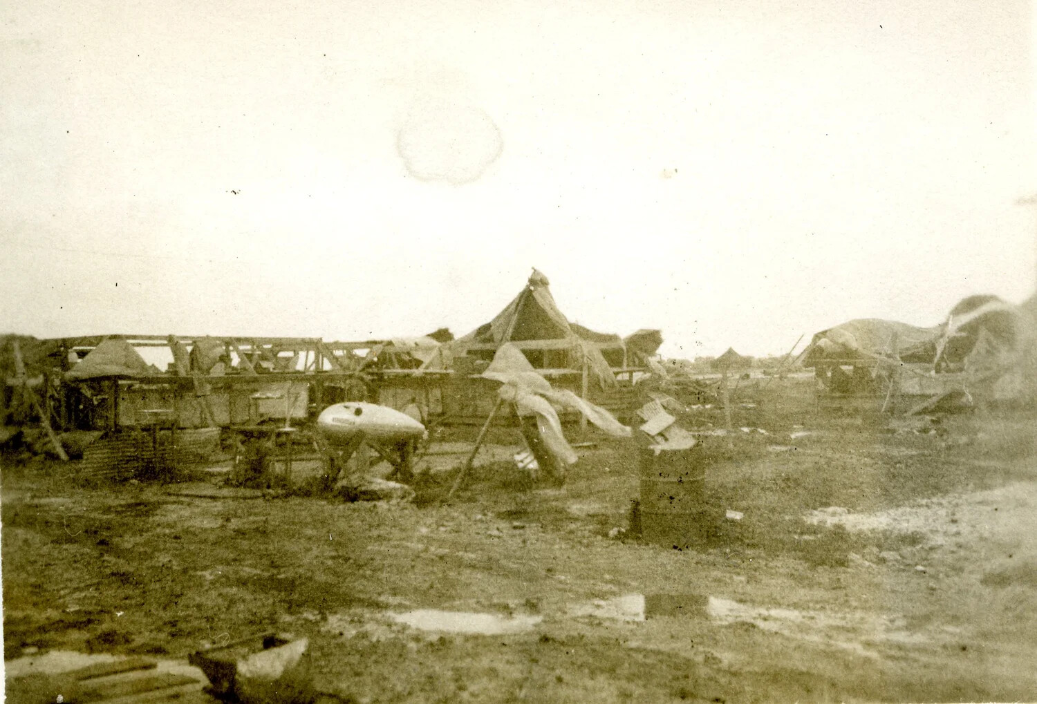 Storm-Damaged Tent Camp with Exposed Wooden Frames, Ie Shima, WWII Photo Album