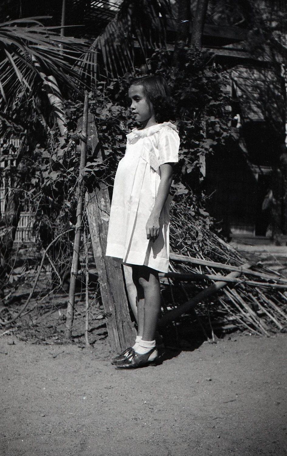 Portrait of a Young Filipino Girl in White Dress, Luzon, Philippines, WWII Era