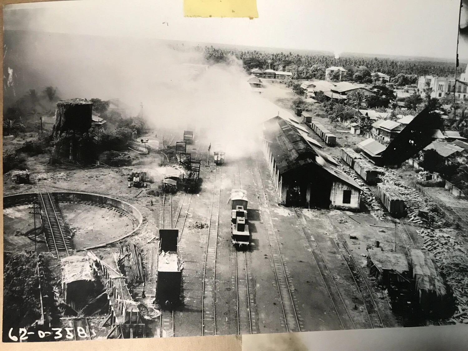 Railway Yard and Turntable Under Attack, Philippines - 312th Bomb Group Strike Photograph
