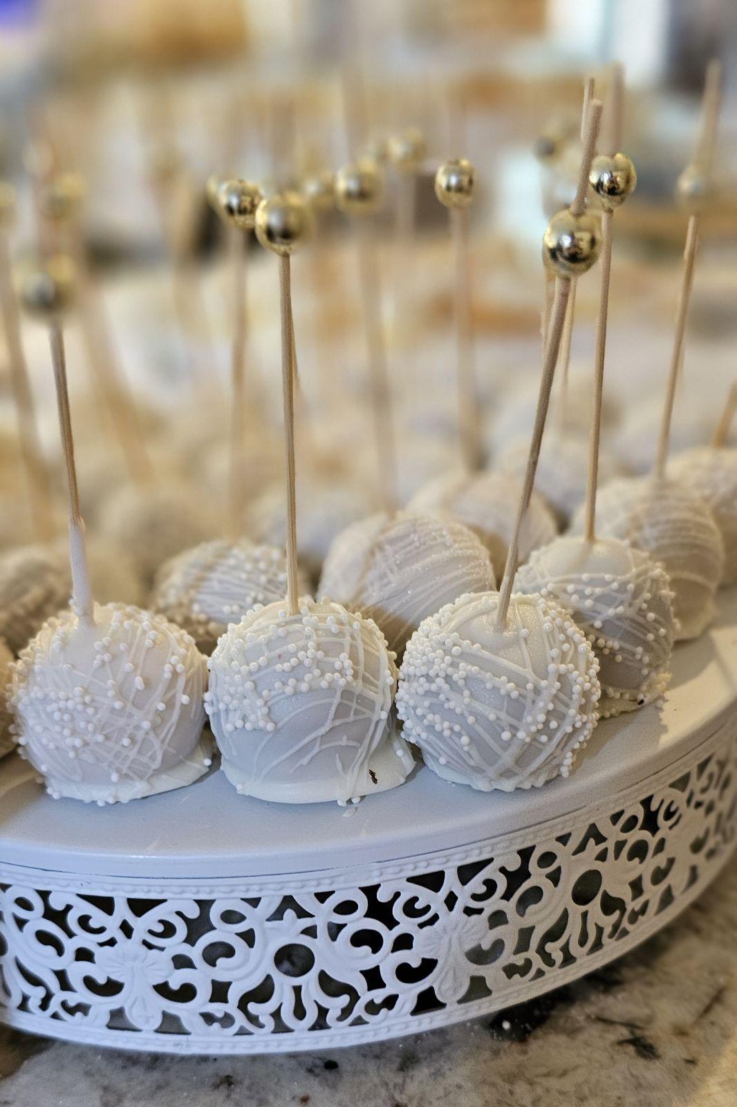 Hand-rolled cake pops dipped in premium chocolate.