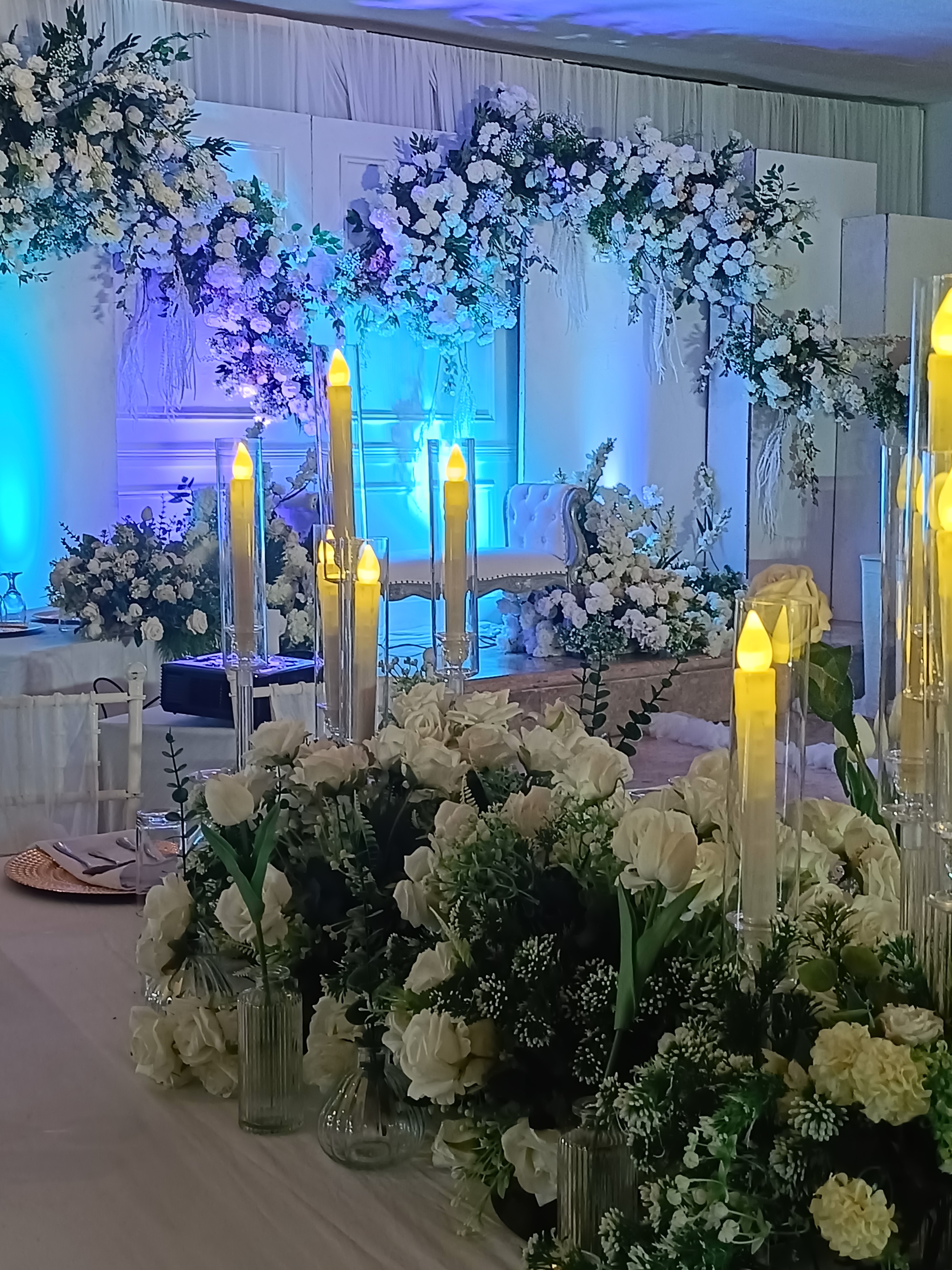 A rooftop dining table set for an elegant event.