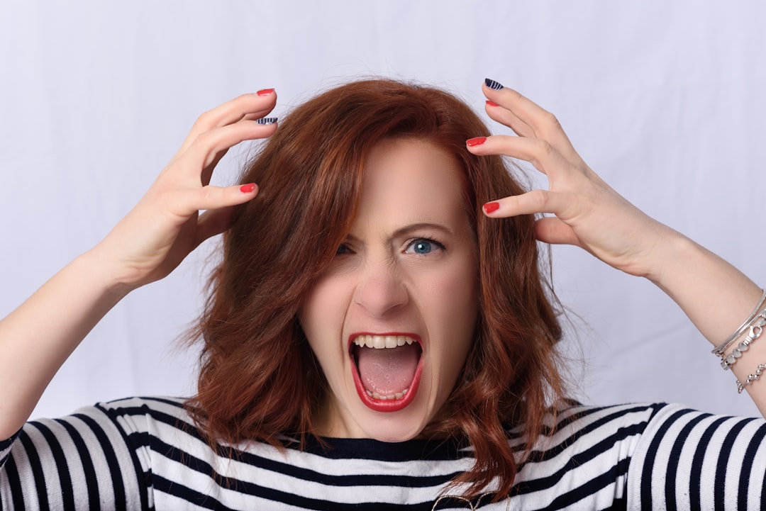 Woman in her 40s reflecting on unusual perimenopause symptoms