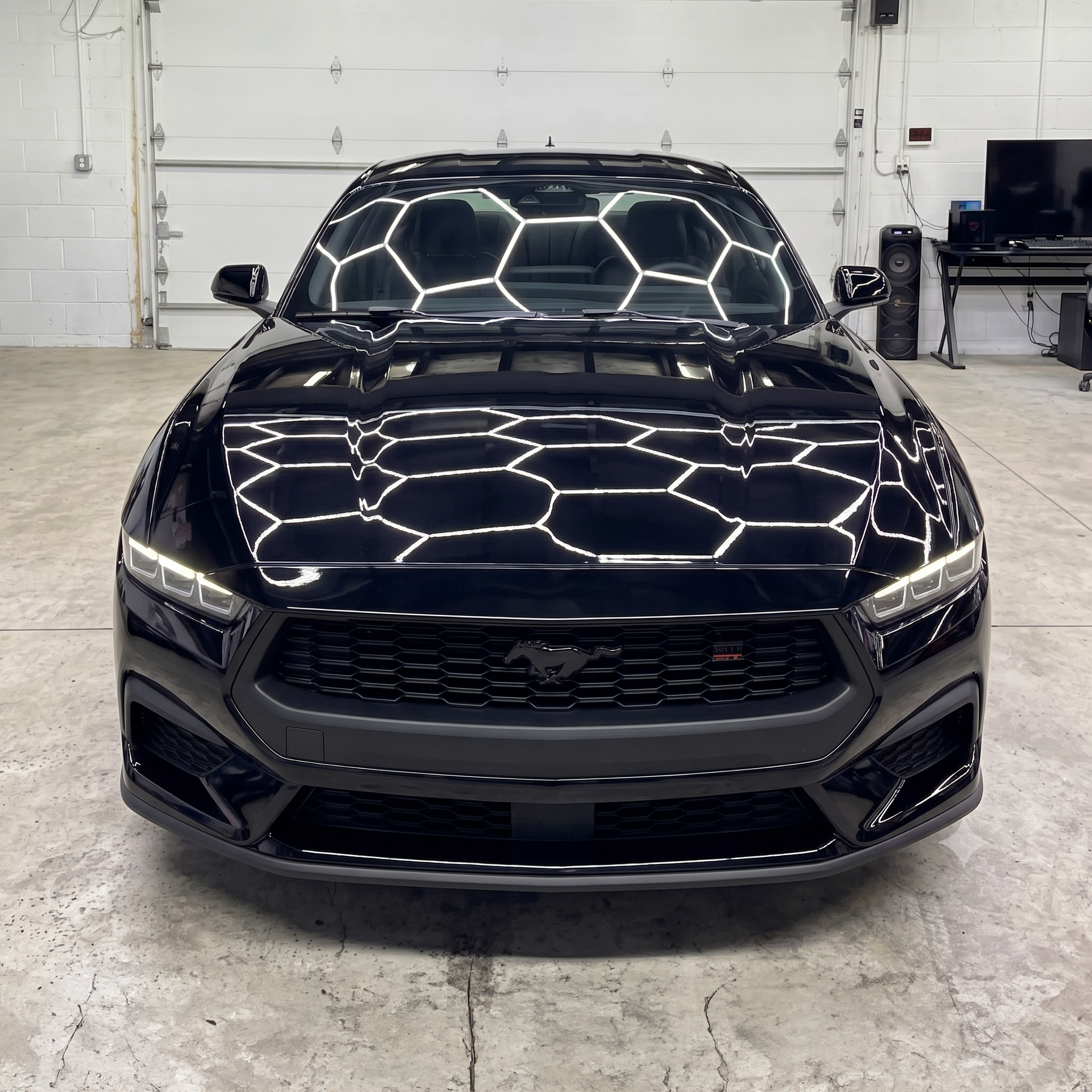 Black Ford Mustang at Precision Tints shop
