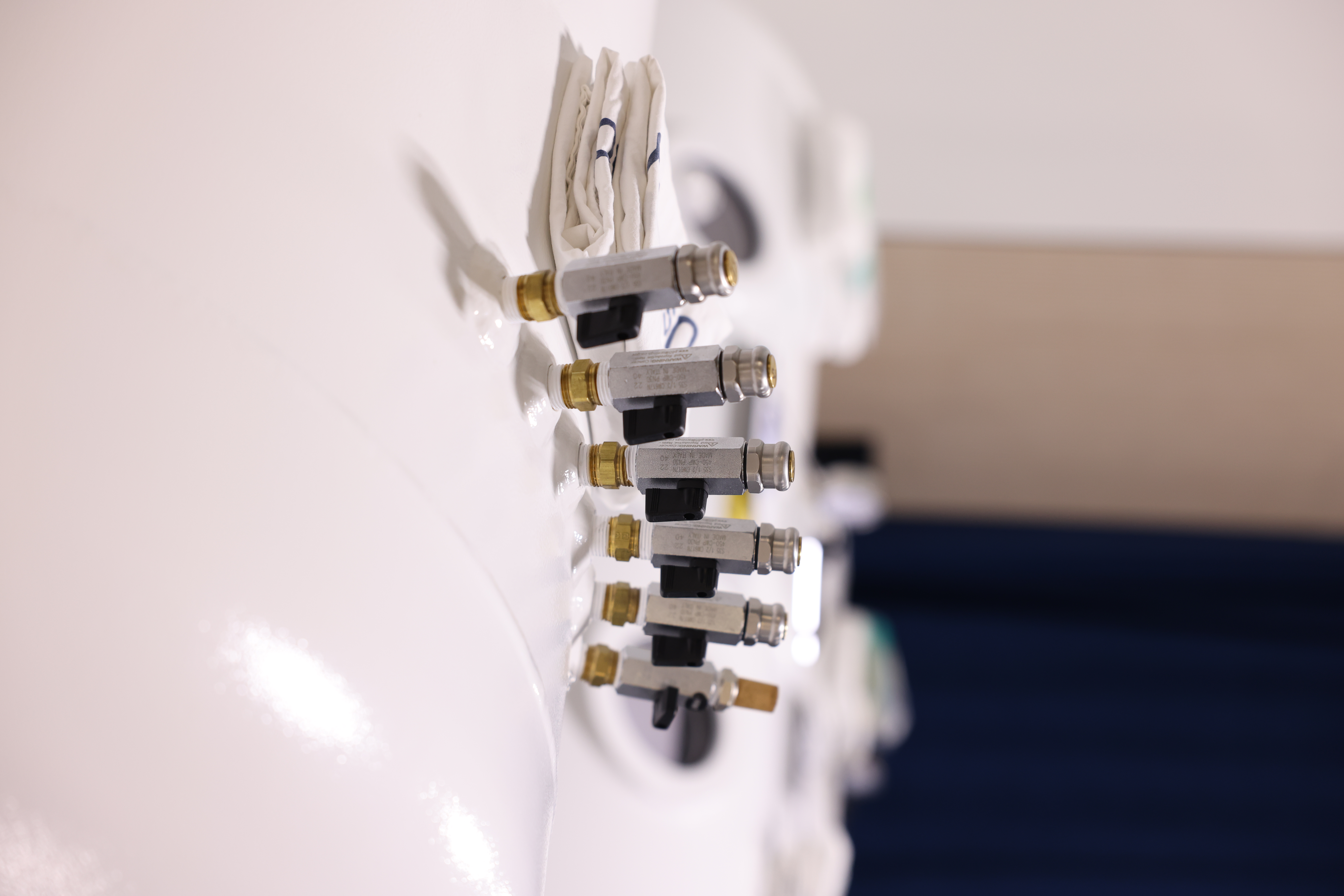 A close-up of fittings on an RX-O2 hyperbaric chamber