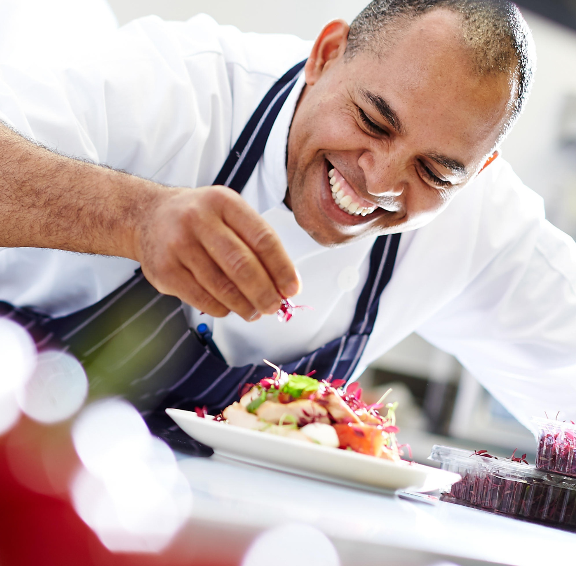 Chef cooking in villa