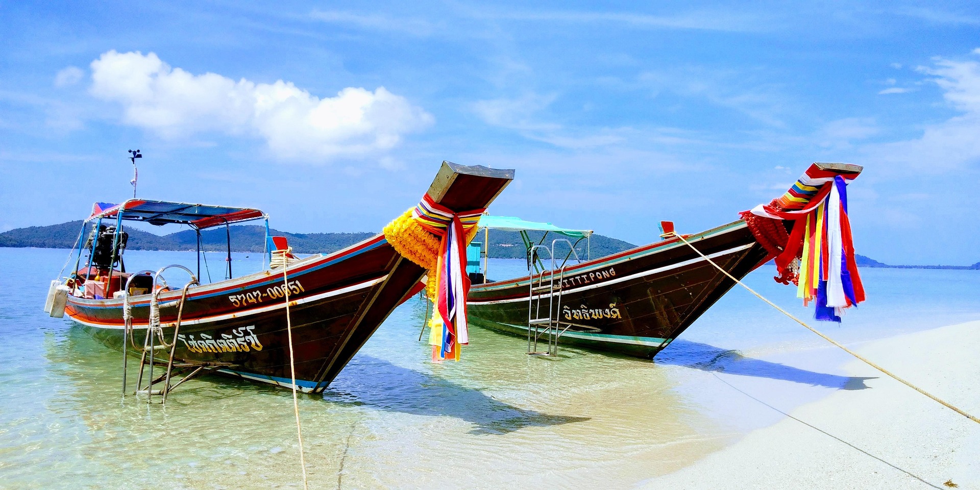Longtail boat on the emerald waters near Koh Samui