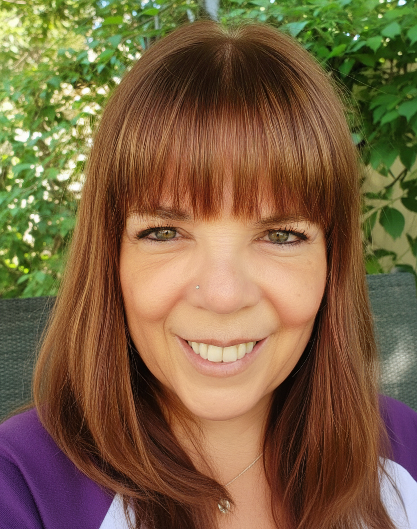 Robyn Bennett, business coach for women over 50, smiling in professional headshot