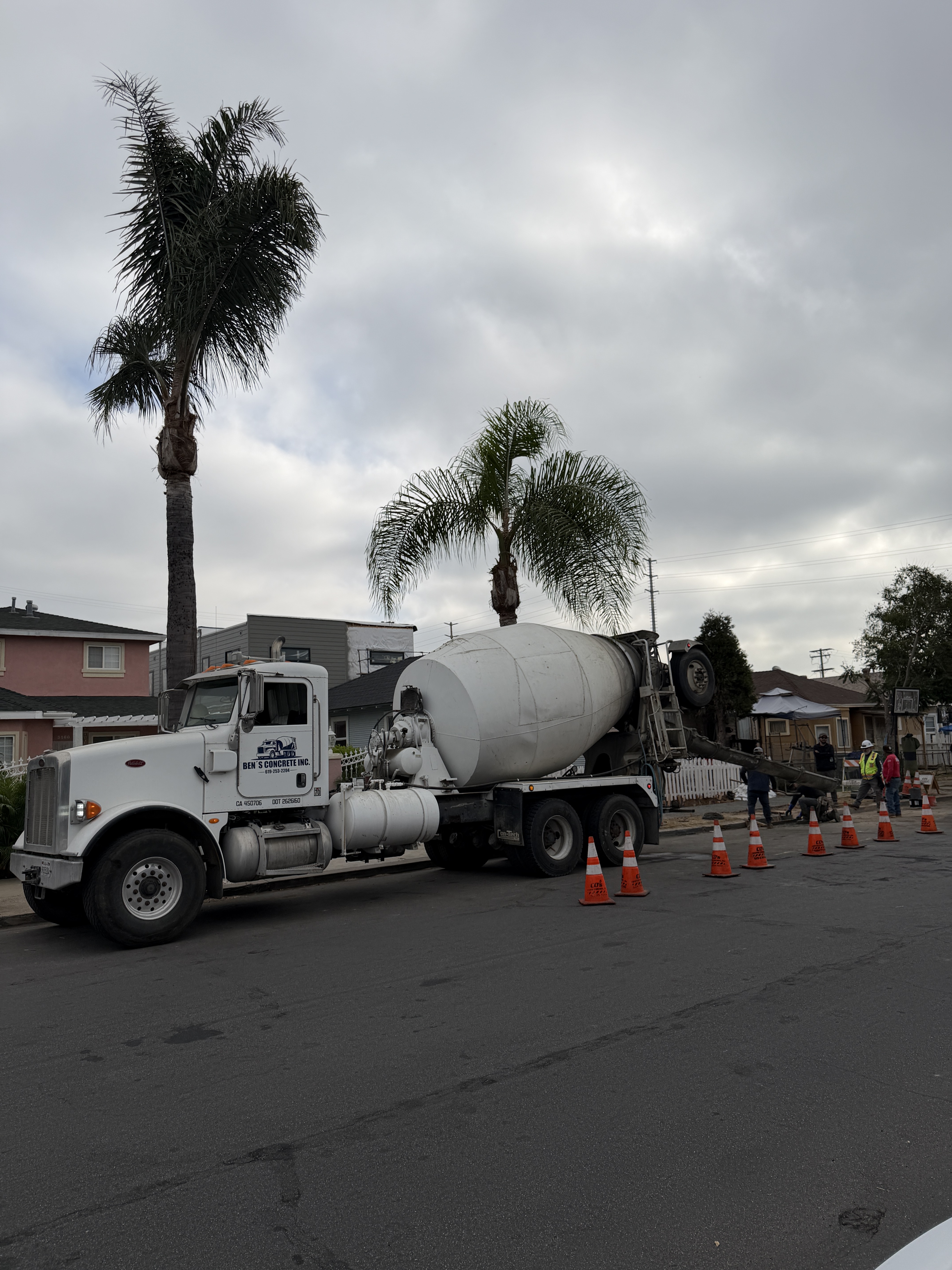 Concrete delivery truck at a job site