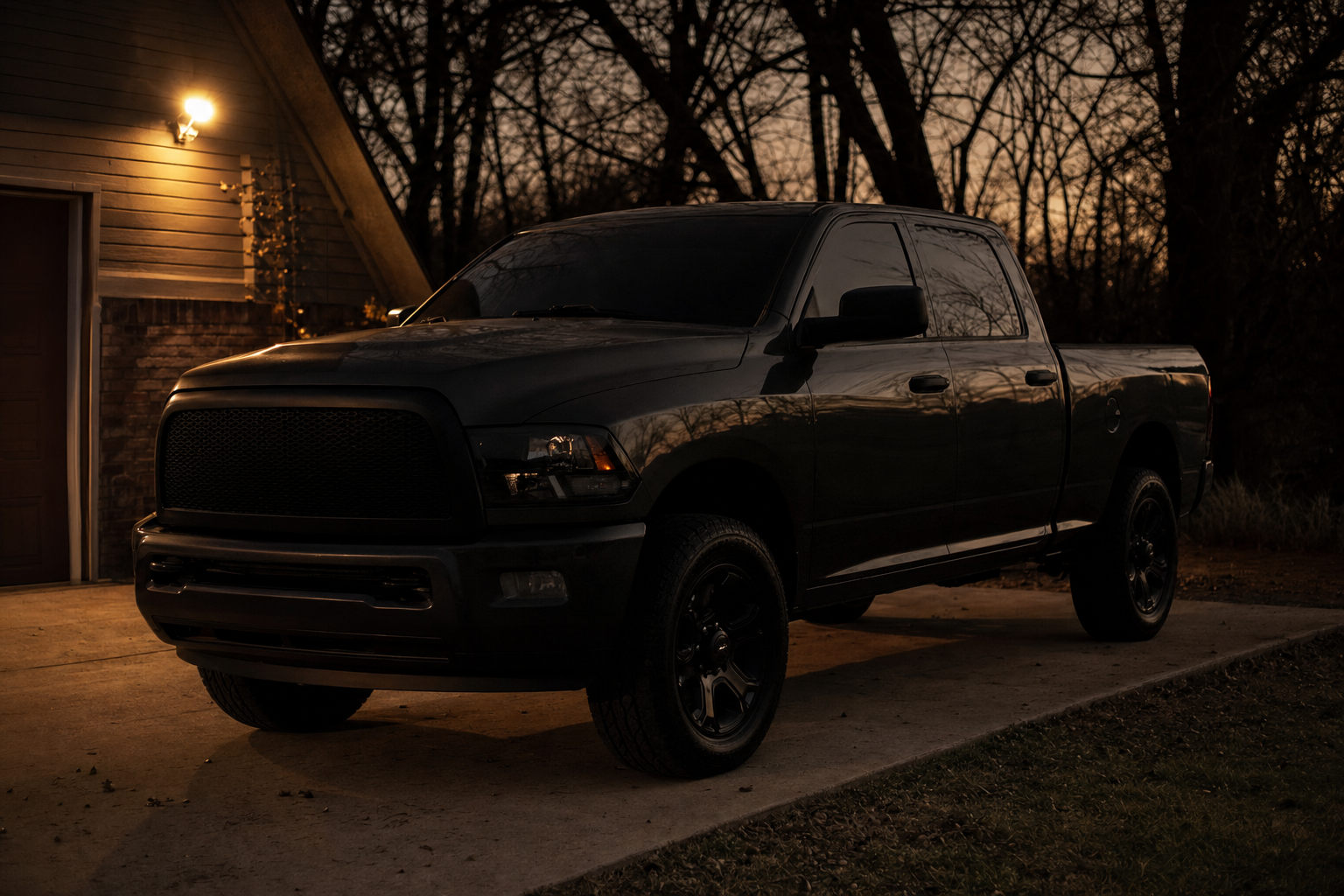 Pickup truck in a driveway during mobile brake service