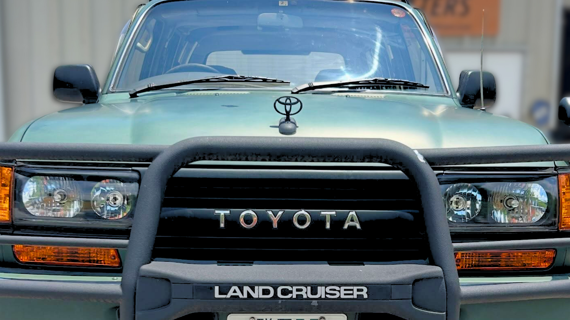 Toyota Land Cruiser front view with off-road bumper and custom lighting