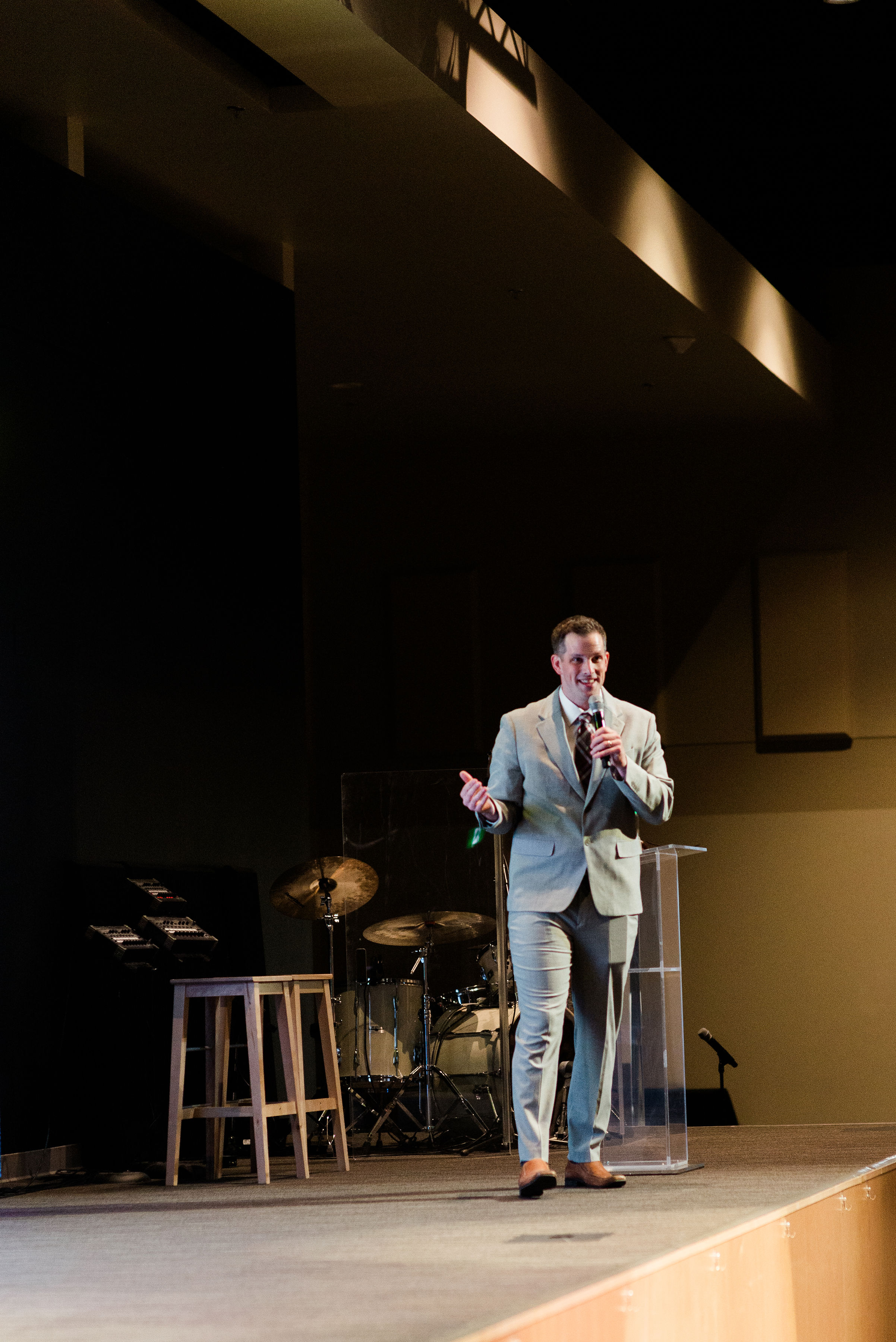A speaker addressing the room from the Freedom Gala stage