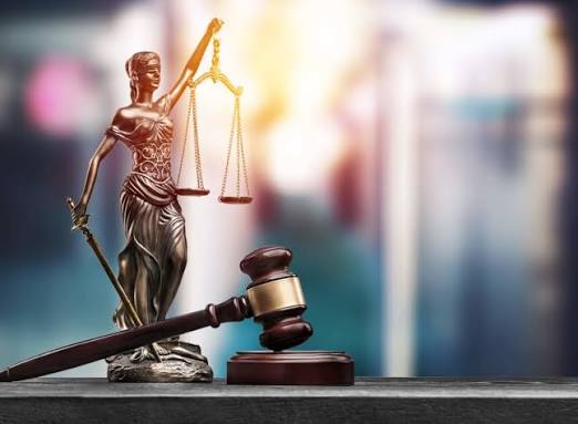 Lady Justice and legal gavel representing private legal counsel