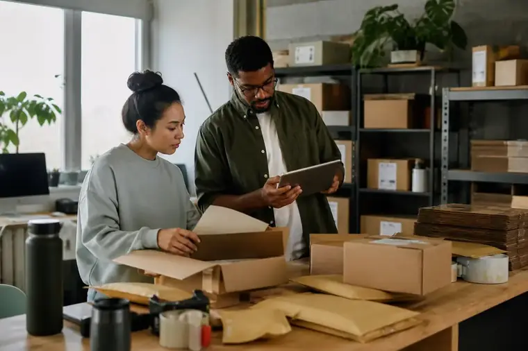 Business owners packing orders