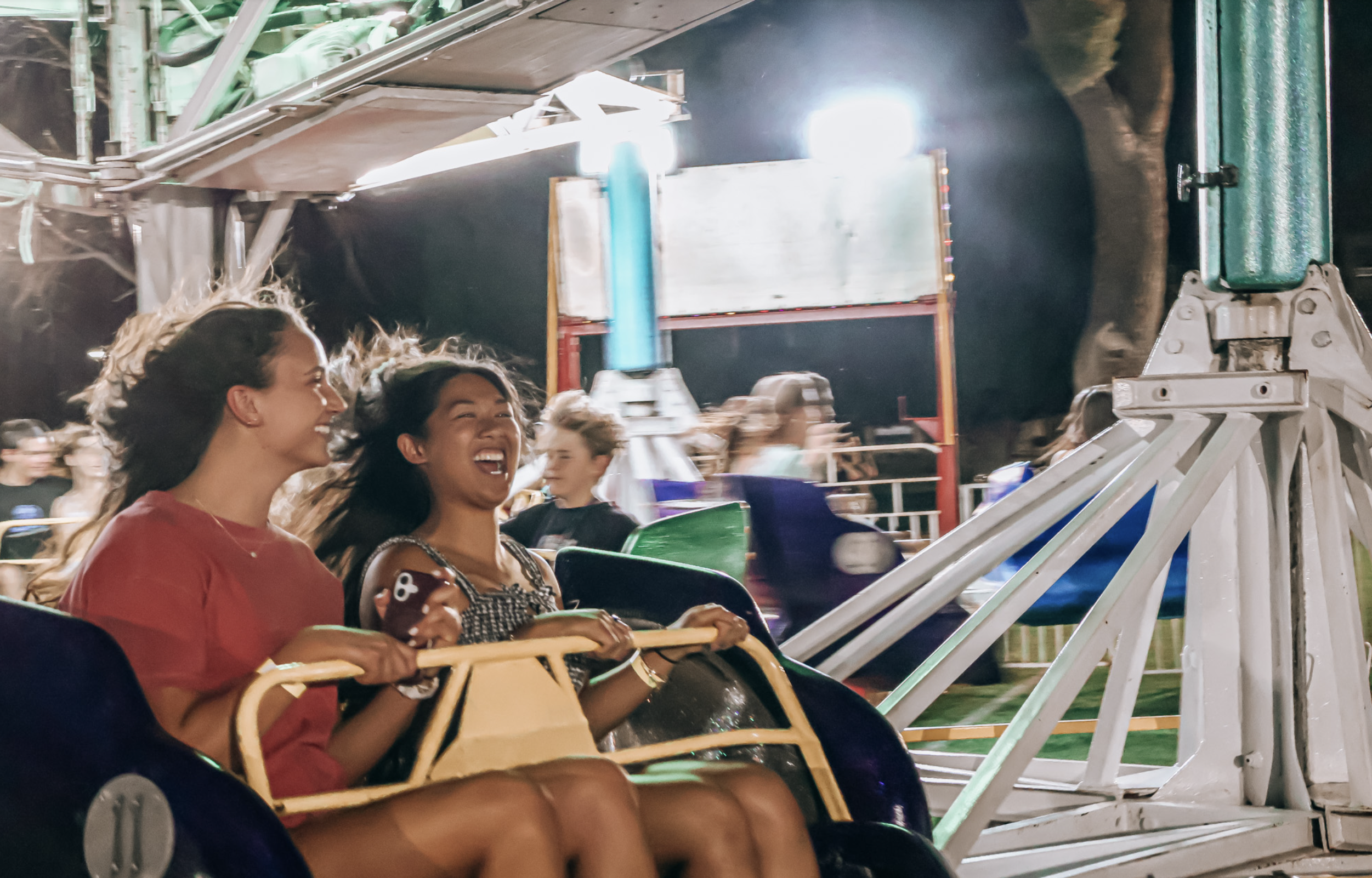 ride and attraction with people on it