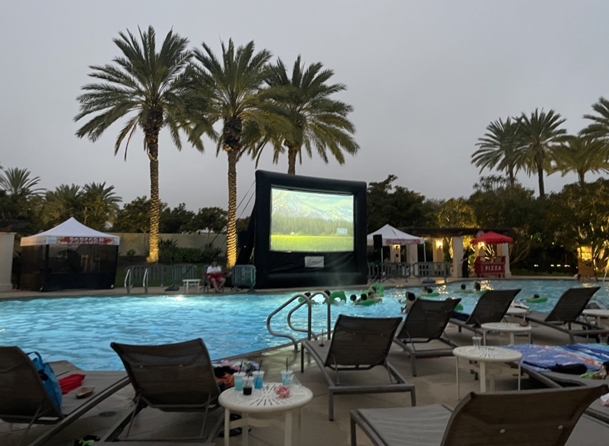 Dive-in movie experience at an HOA community pool