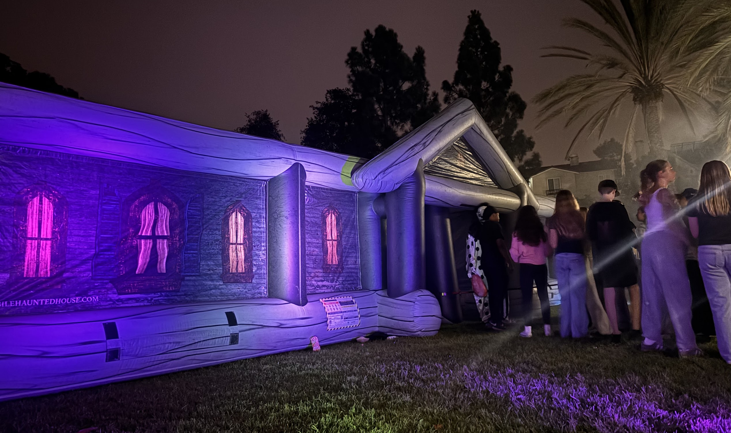 Inflatable mobile haunted house at an HOA community event