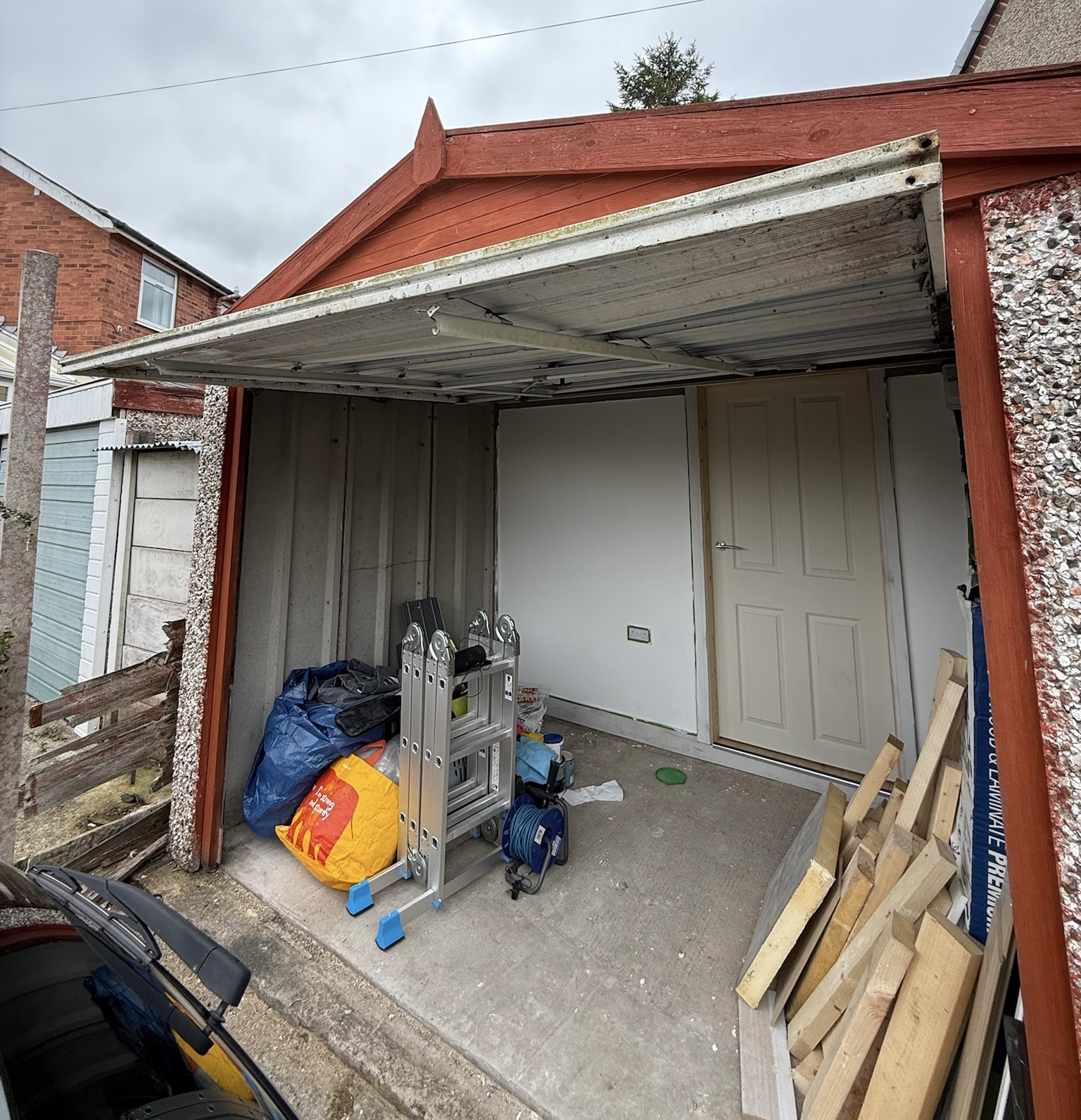 Garage conversion in Chorley with a partition wall added to retain the front section as storage while converting the rear into a usable room Garage conversion in Chorley with a partition wall added to retain the front section as storage while converting the rear into a usable room