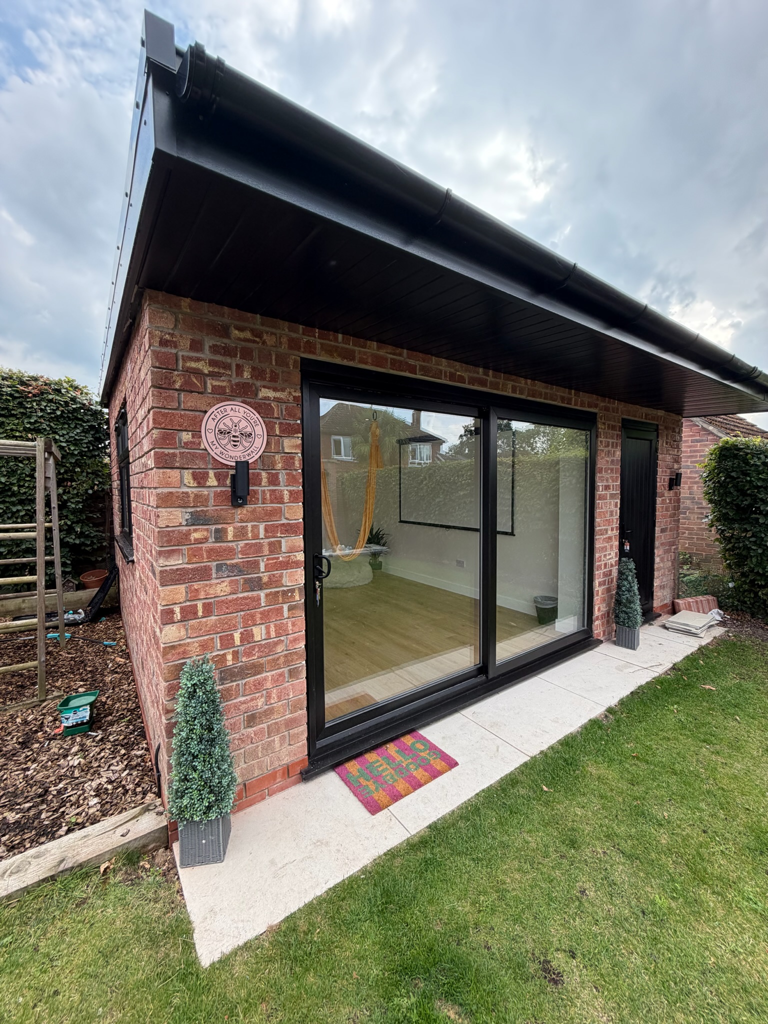 Double garage conversion in Wilmslow transformed into a gymnastics room with large sliding doors, natural light and separate storage space. Double garage conversion in Wilmslow transformed into a gymnastics room with large sliding doors, natural light and separate storage space.