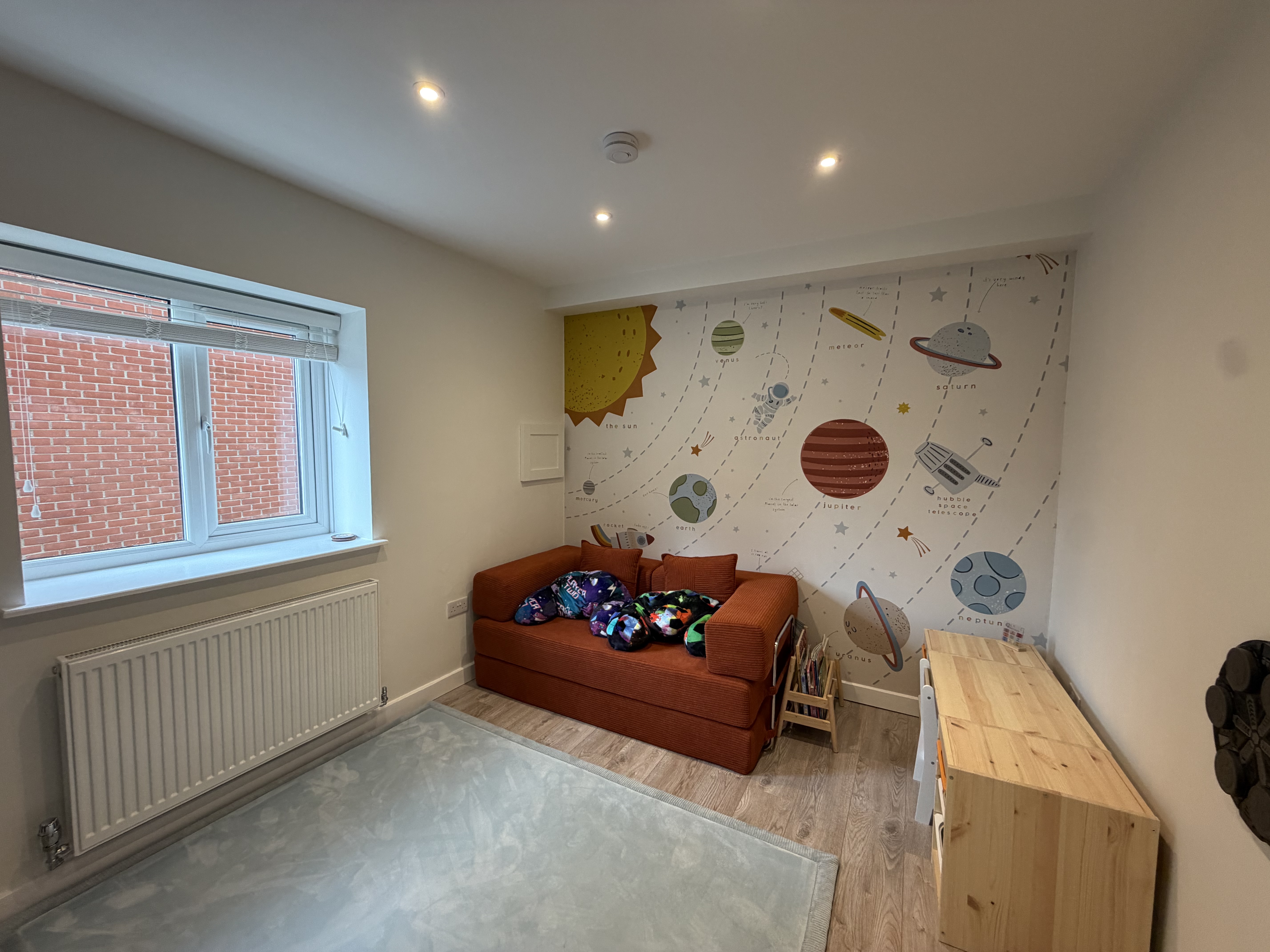 Narrow single garage conversion in Warrington transformed into a children’s playroom while retaining useful garage storage at the front. Narrow single garage conversion in Warrington transformed into a children’s playroom while retaining useful garage storage at the front.
