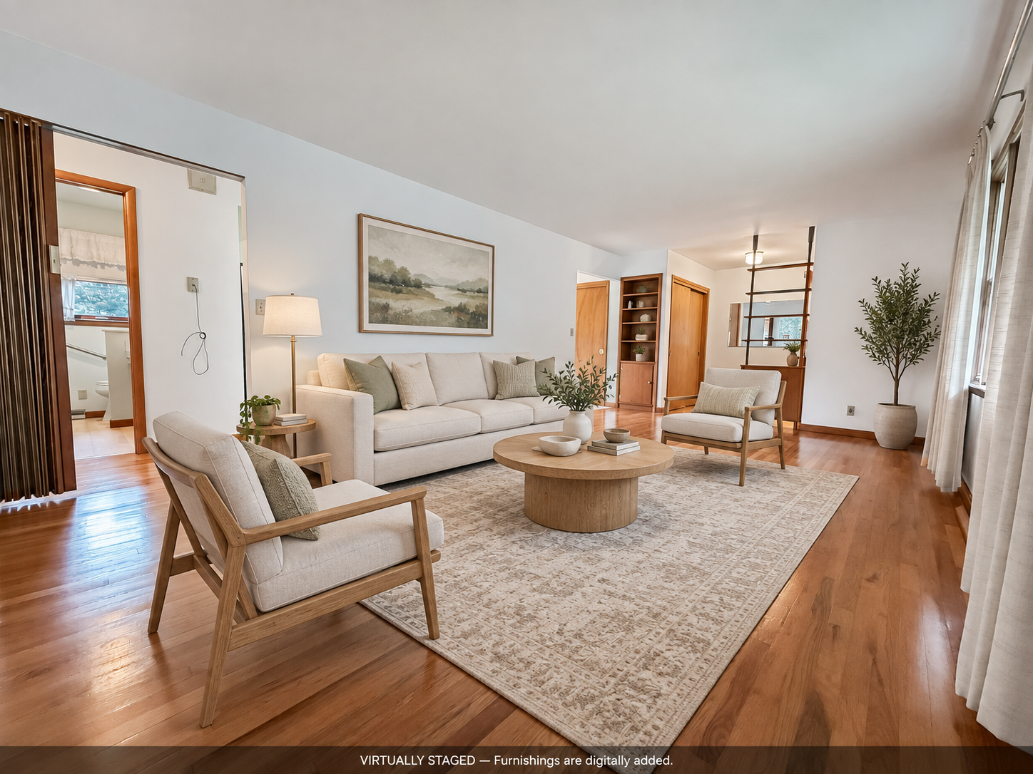 Virtually staged living room showing a possible furniture arrangement