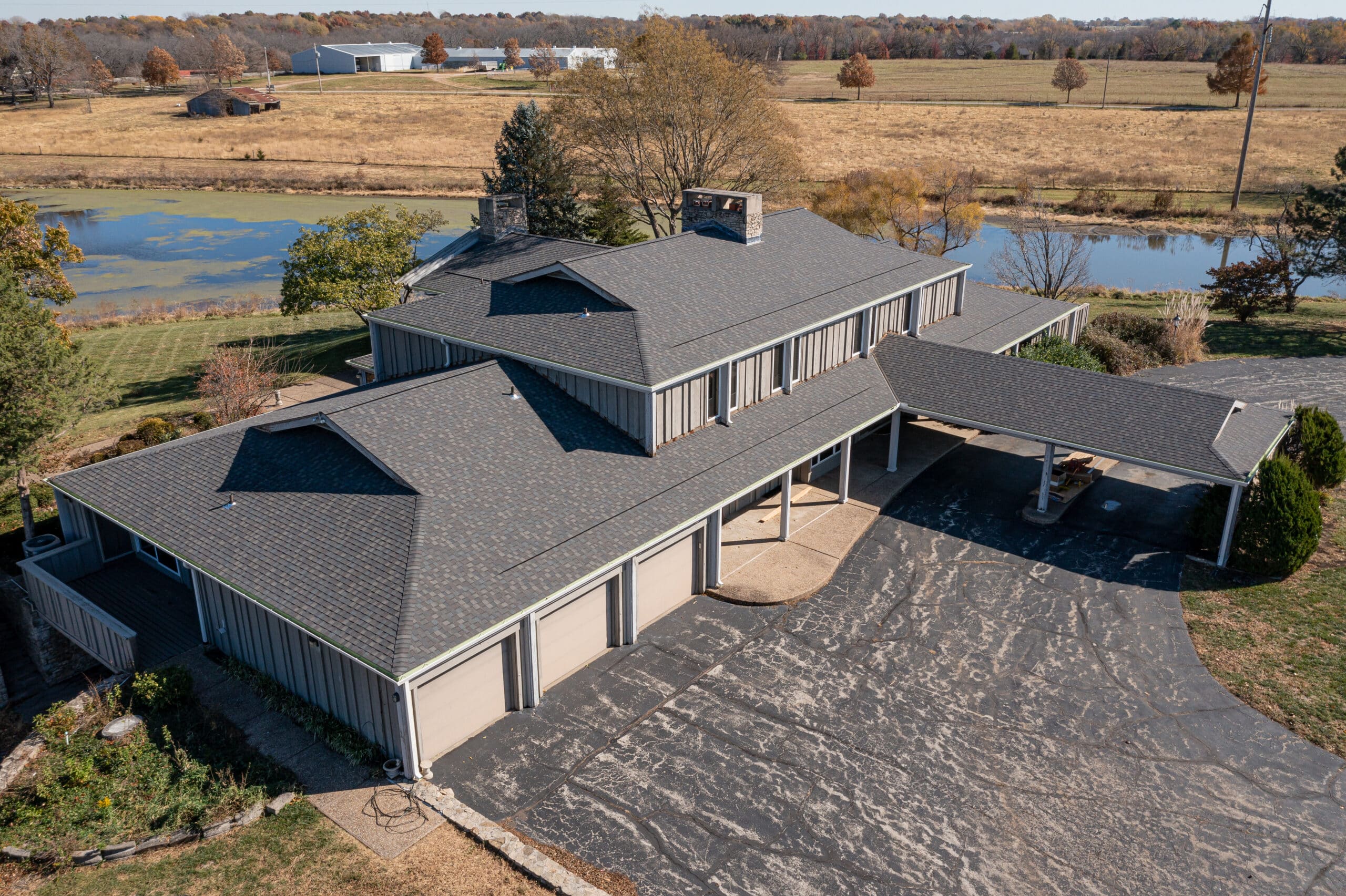 Pyramid Roofing professional inspecting a residential roof