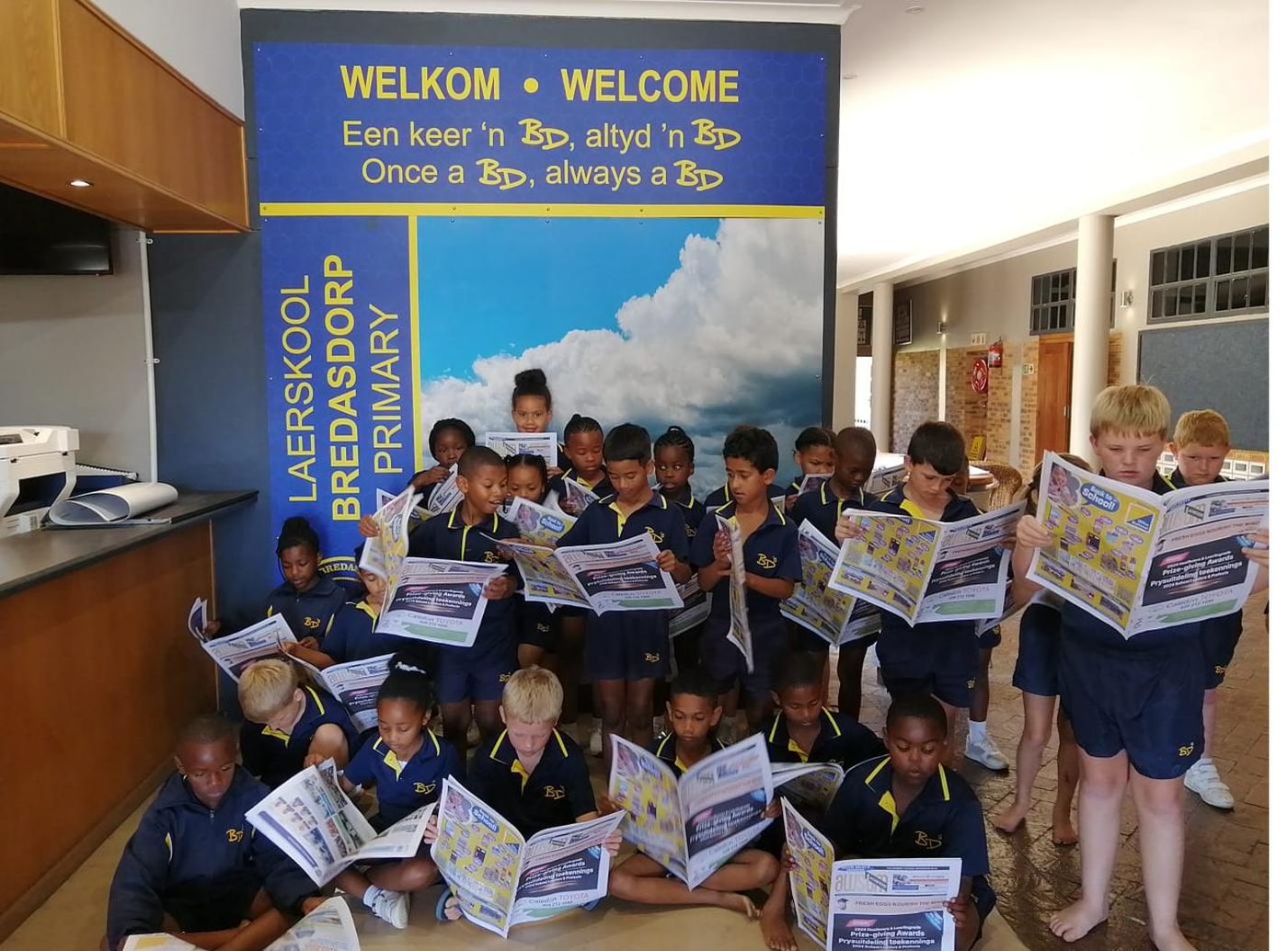 Learners at a participating school with an AWSUM publication