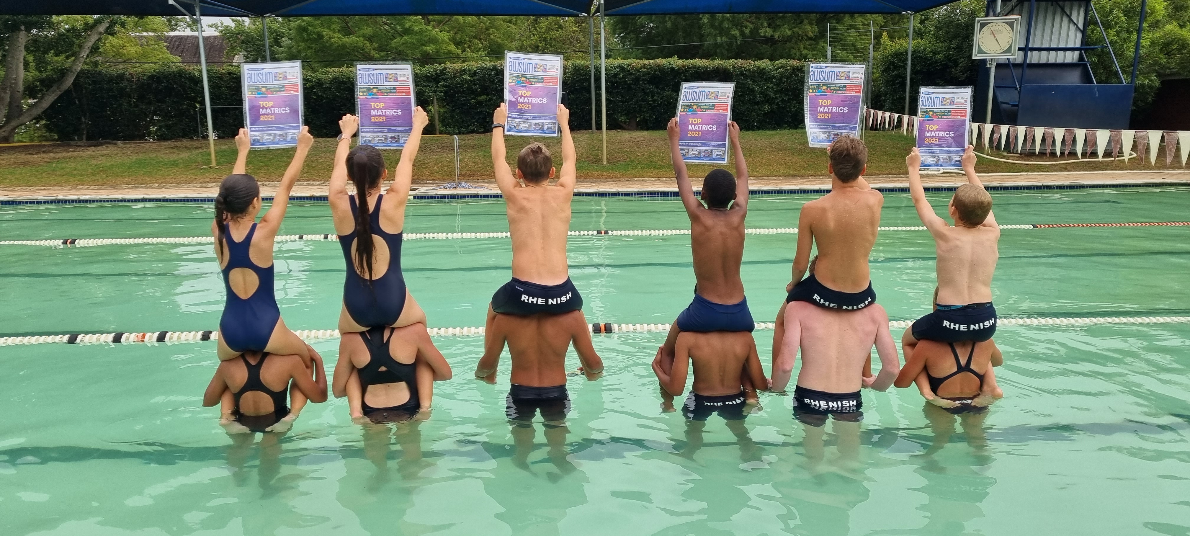 AWSUM advertising running across print and digital in school communities