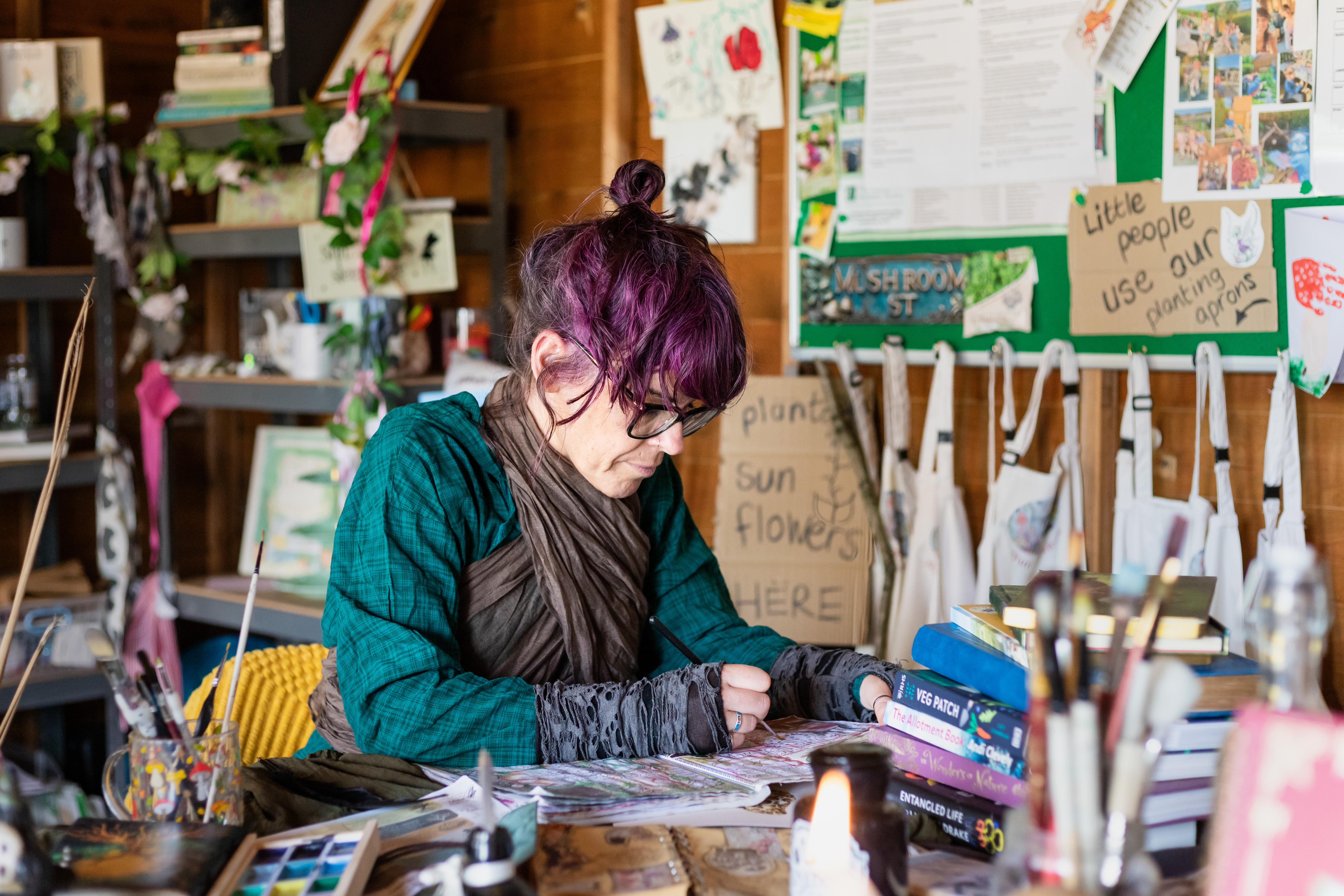 Kylie Dixon writing at her desk