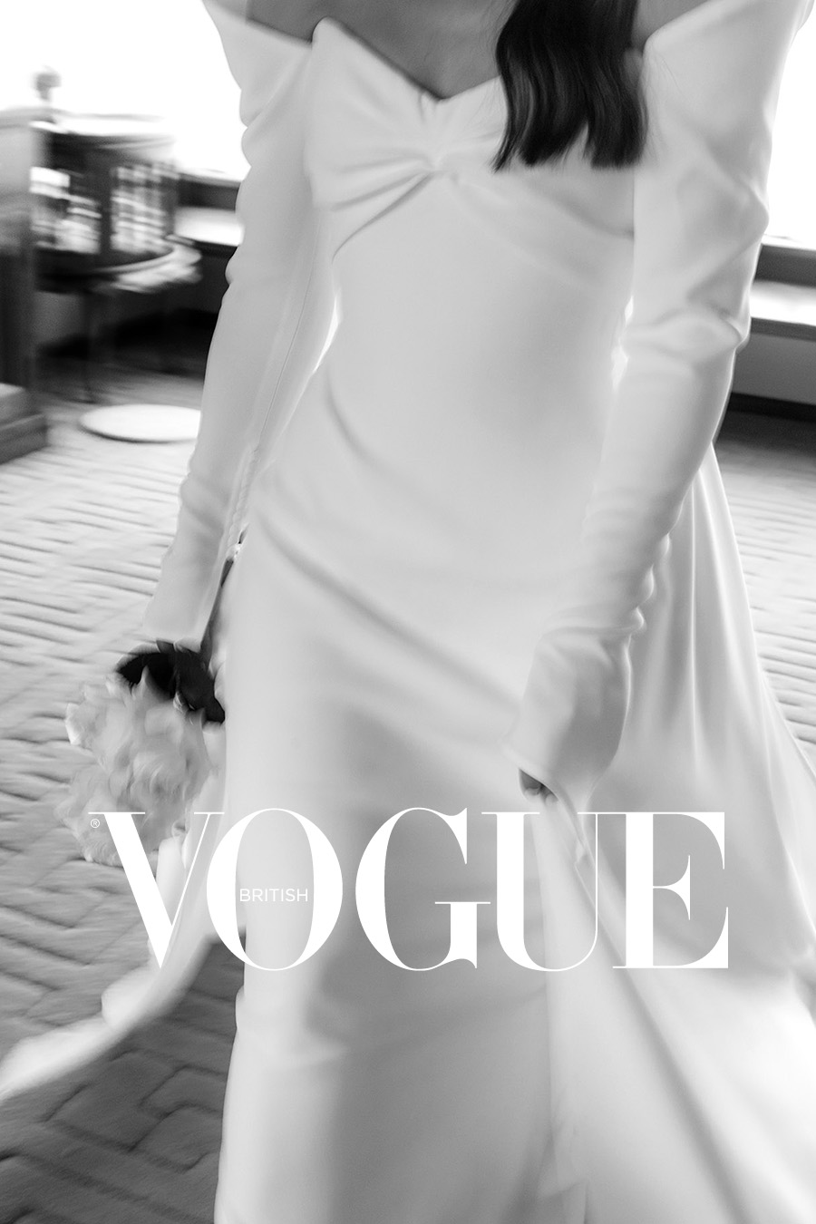 Bride in a satin gown and gloves, featured in British Vogue