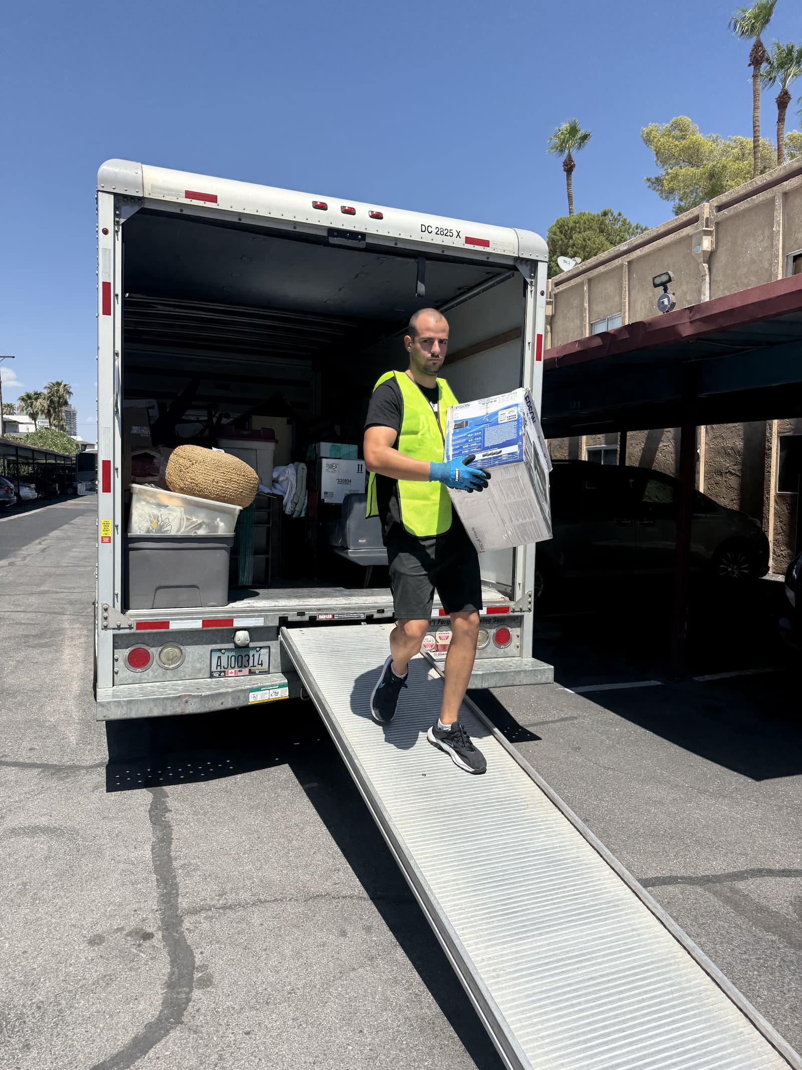 Packed and wrapped furniture loaded in a Flex Movers truck