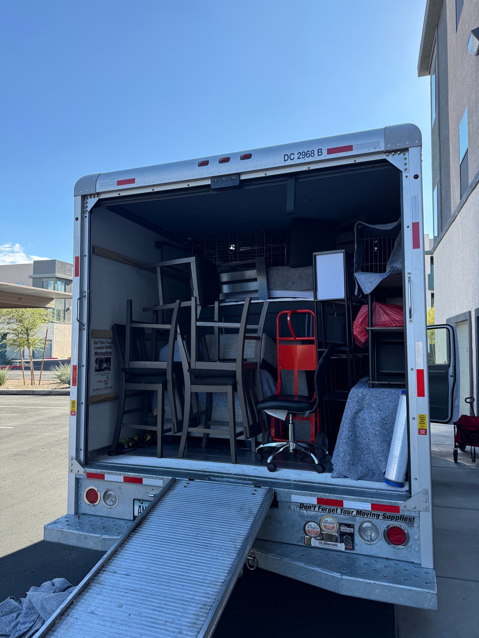 Flex Movers movers wrapping furniture before transport