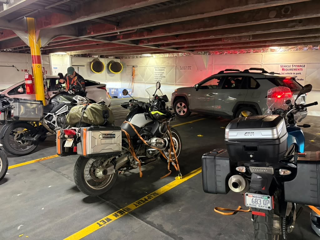 Hatched down motorcycle on ferry