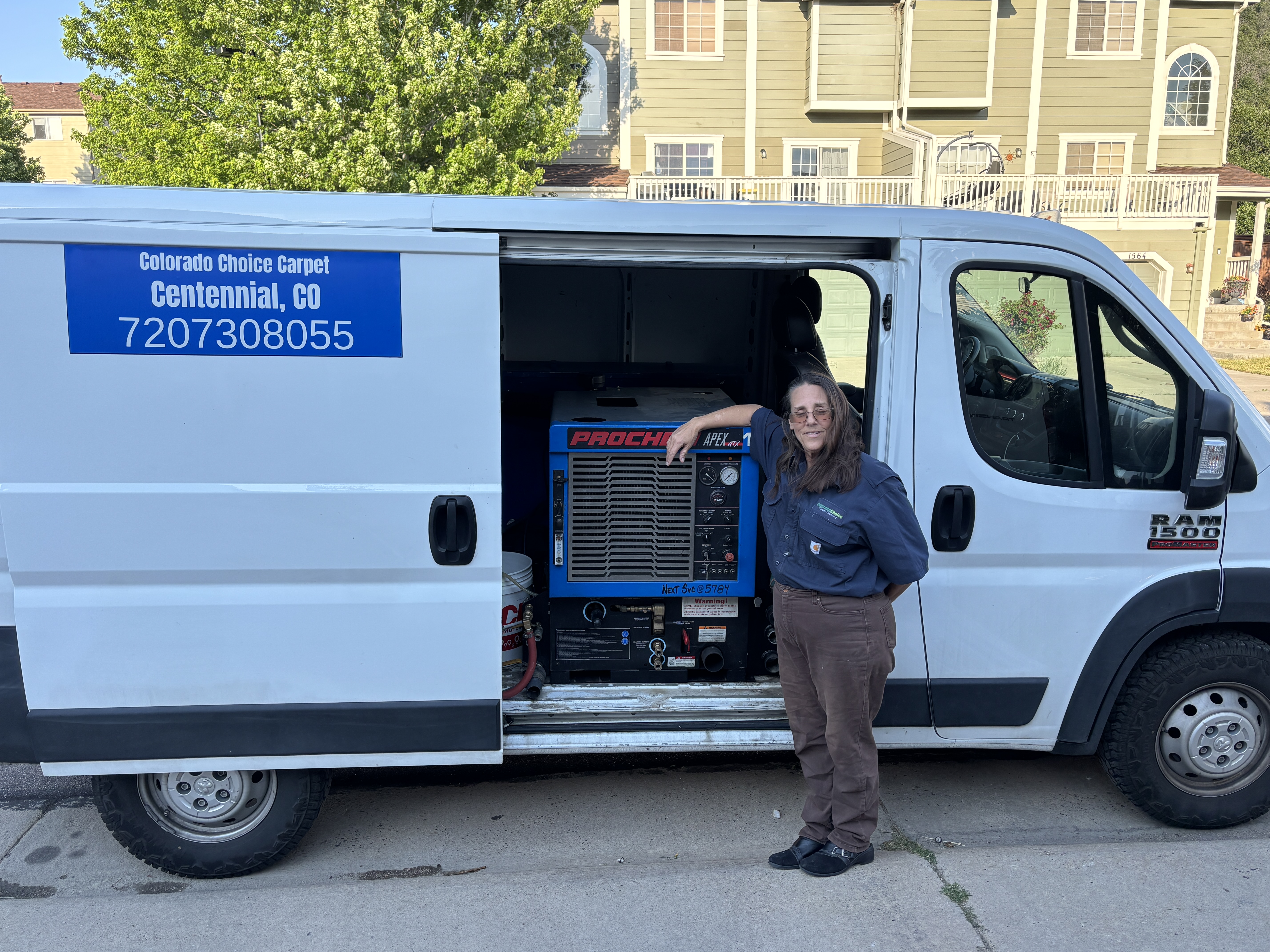 Kim Pratt of Colorado Choice Carpet Cleaning with the truck mount carpet cleaning van Kim Pratt of Colorado Choice Carpet Cleaning with the truck mount carpet cleaning van
