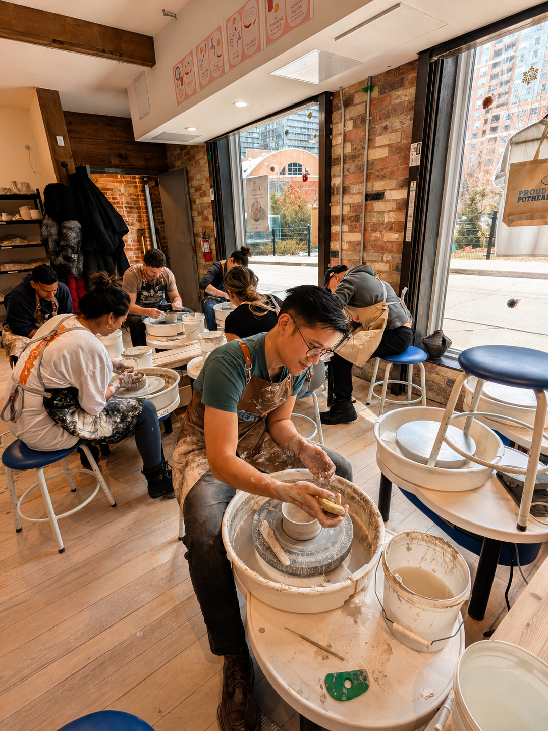 Handmade pottery pieces displayed inside Spin Pottery Studio