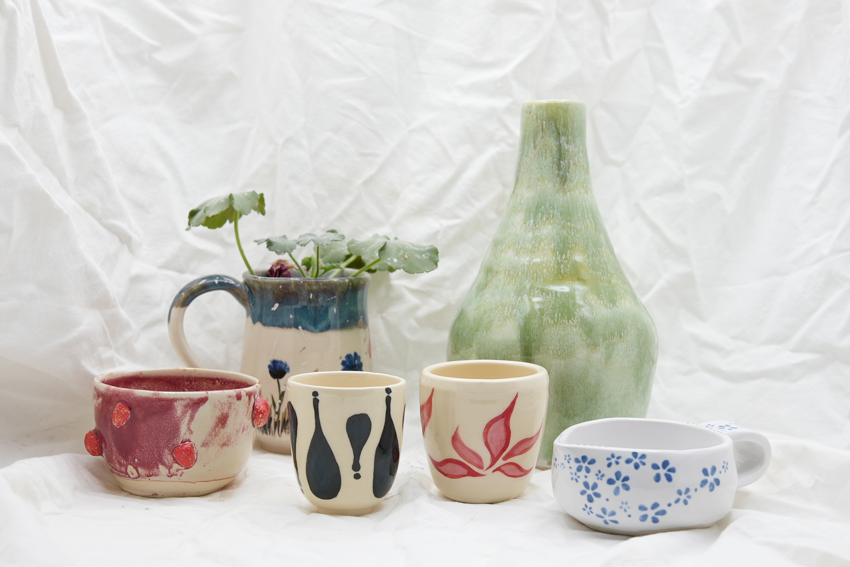 Student learning pottery fundamentals in a 6-week class