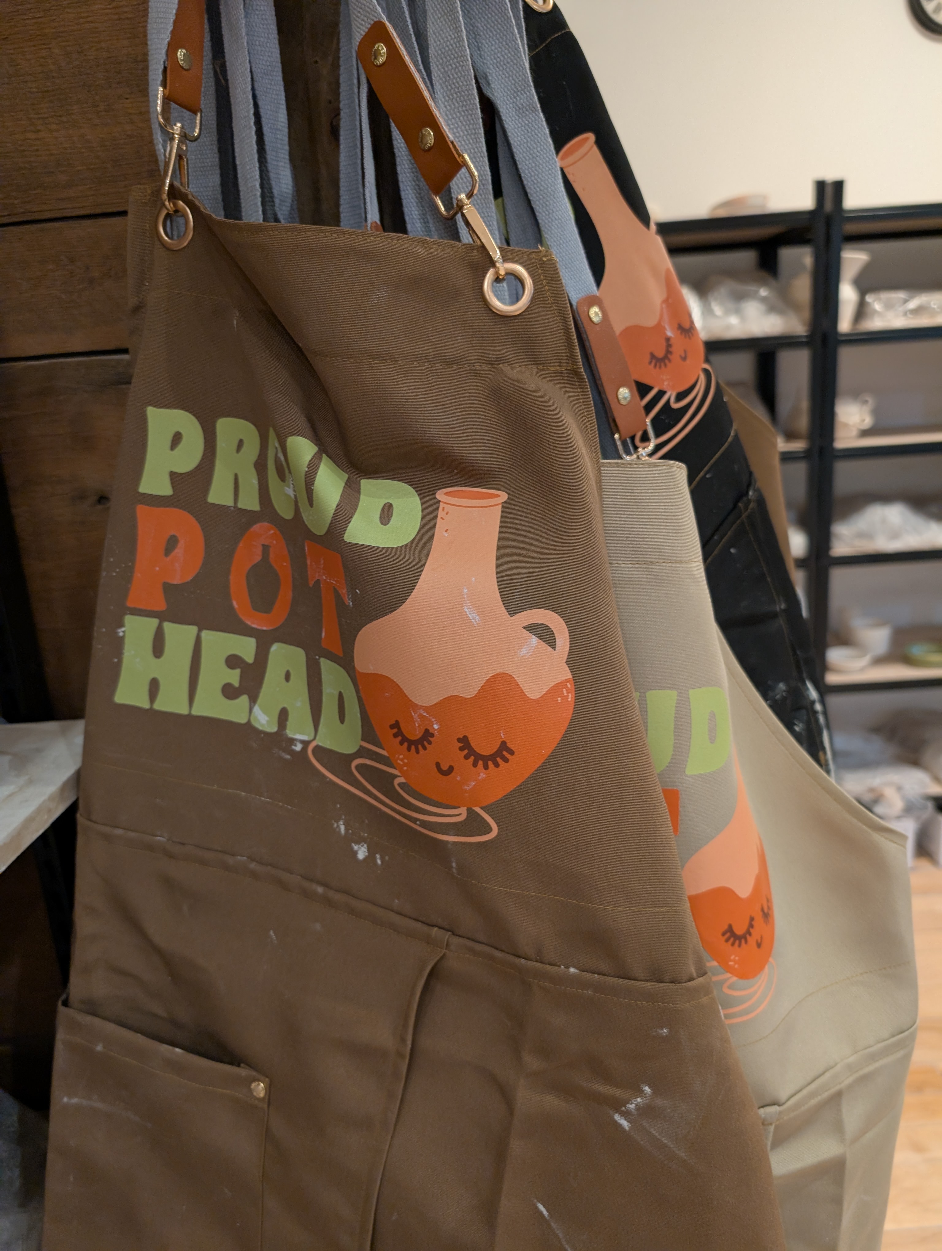 Proud Pothead — Green & Orange split-leg pottery apron