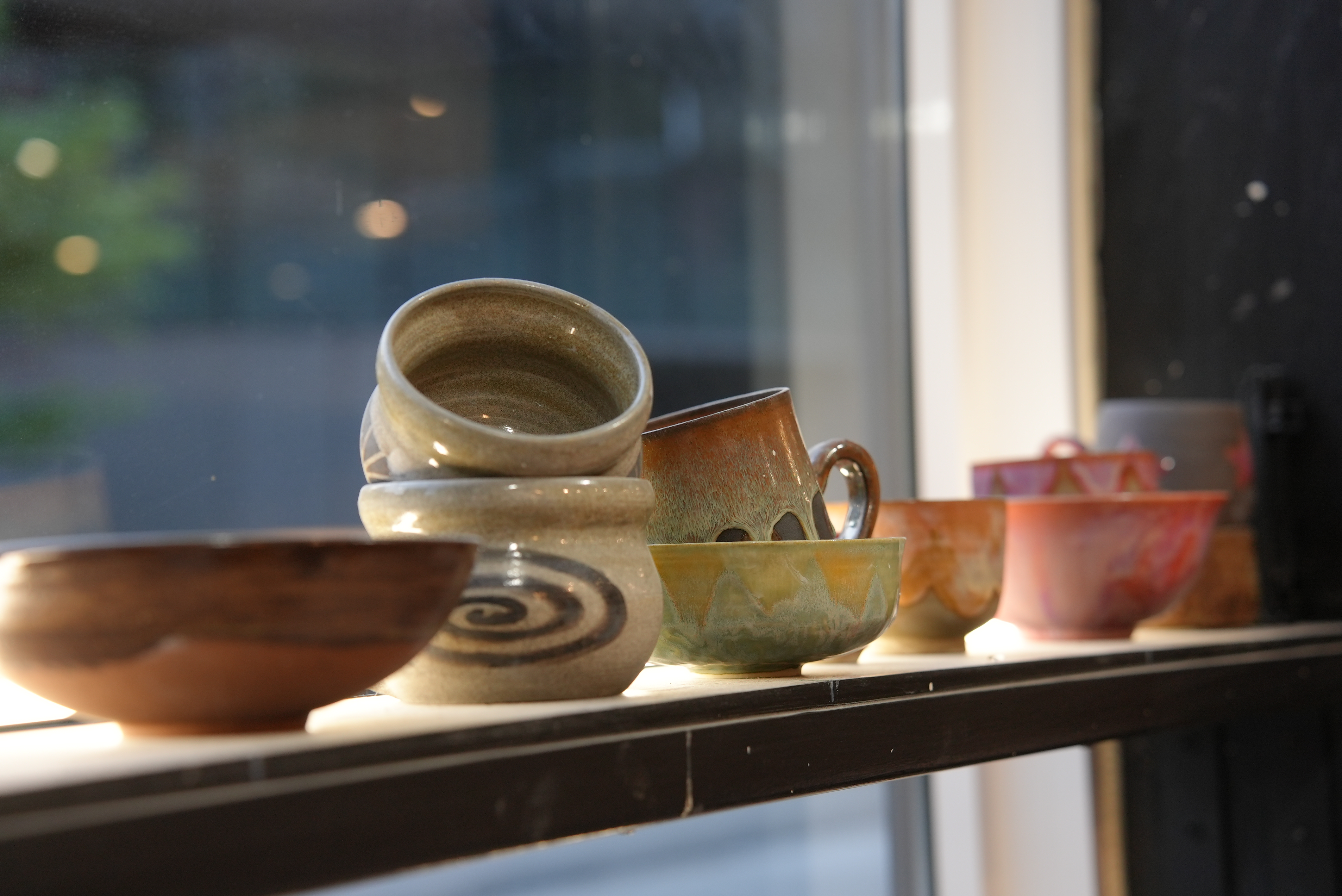 Students developing their pottery skills during an eight-week class at Spin Pottery Studio.