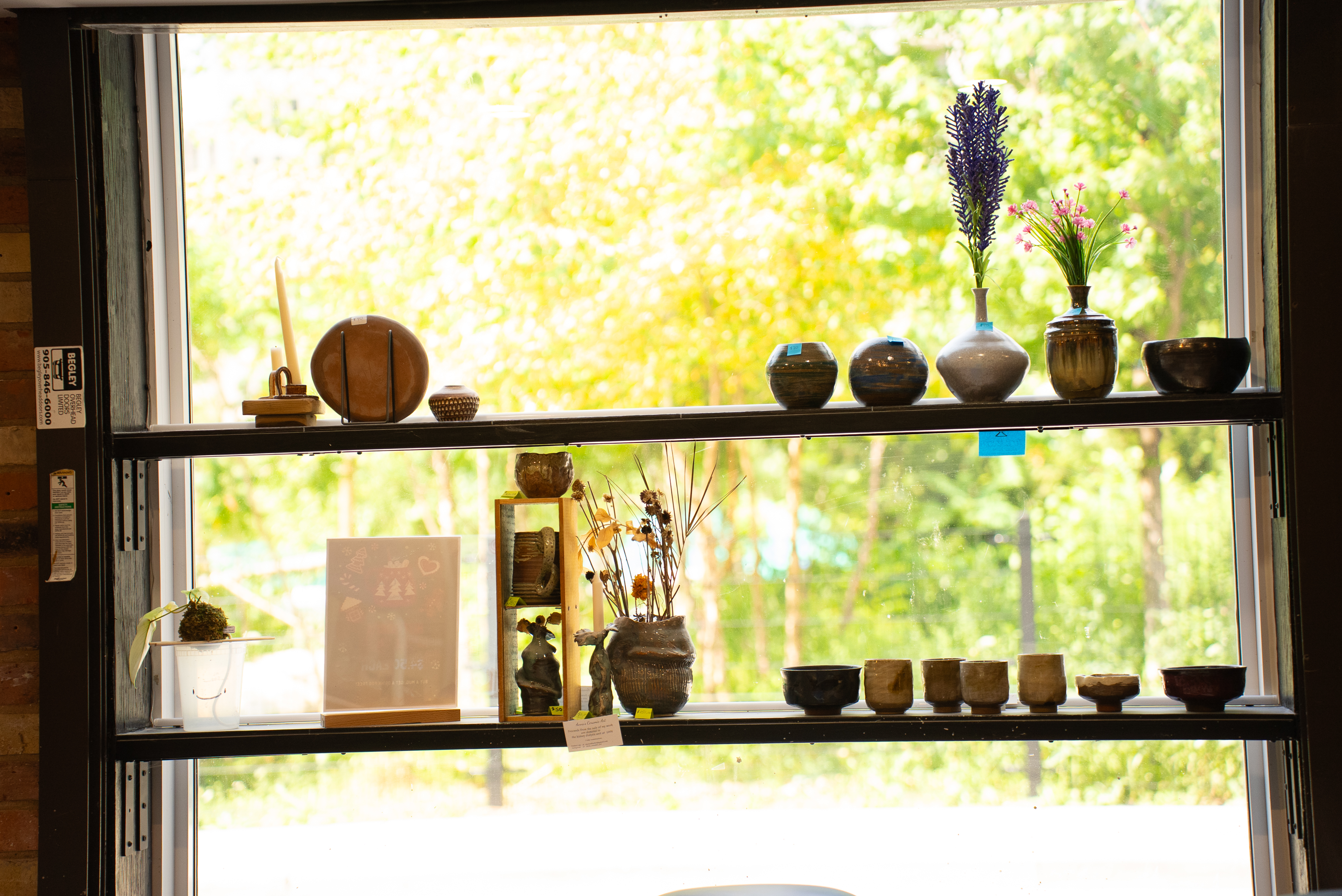 Students learning pottery during a six-week class at Spin Pottery Studio.