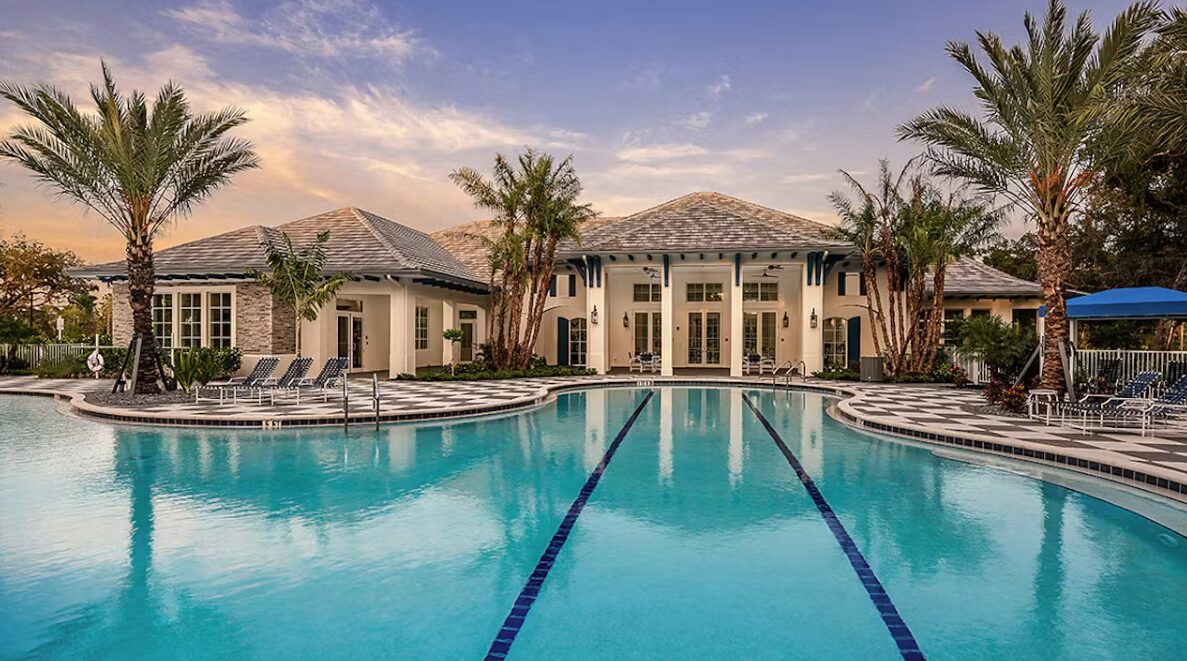 Grand Palm resort-style pool at sunset in Wellen Park, Venice Florida