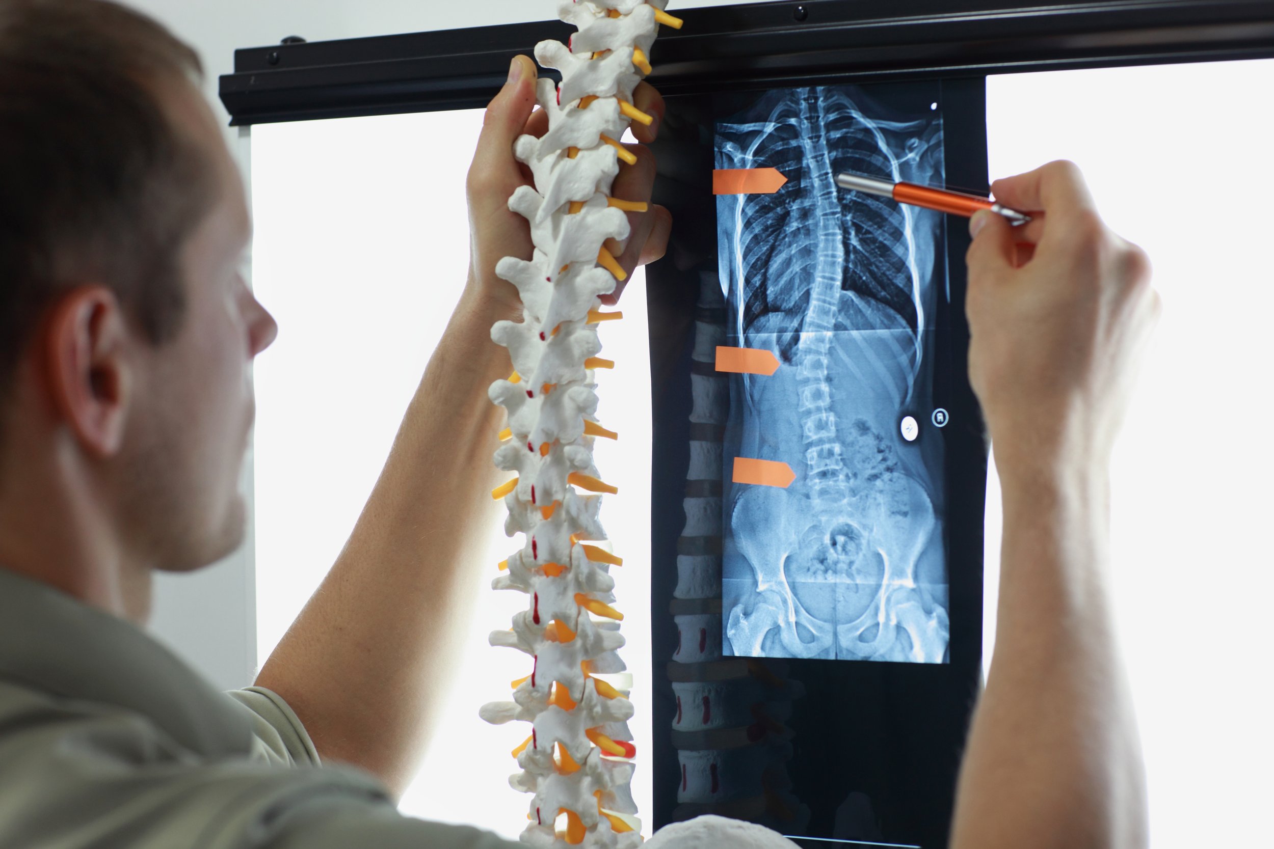 A chiropractic patient receiving care at Lake Nona Chiropractic, illustrating the hands-on treatment our blog articles explain