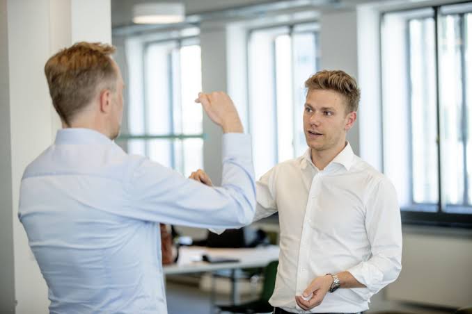 A SAMM provider greeting a male patient