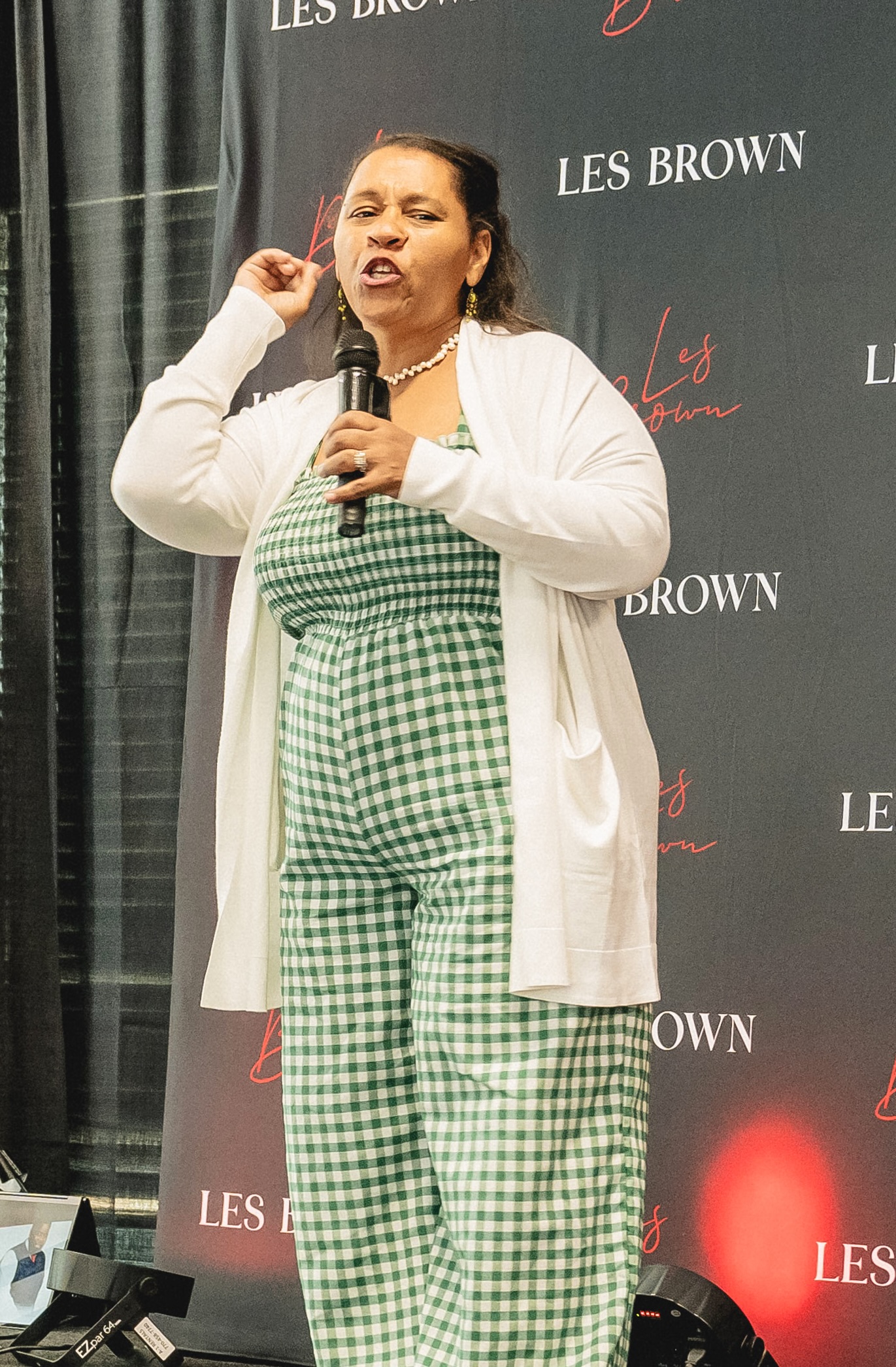 TammyRenee speaking on stage