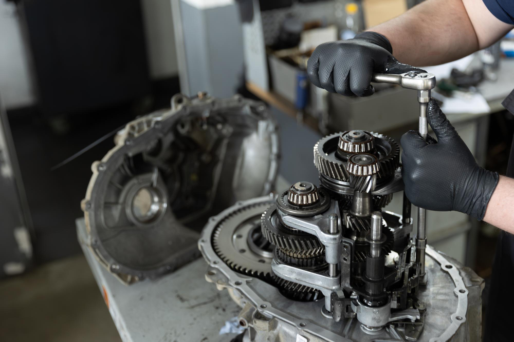 Internal view of an automotive transmission with interlocking gears and synchronizer rings