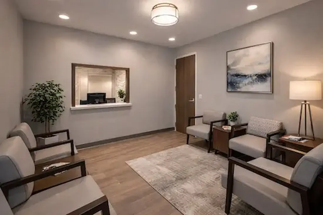 Medivira clinic waiting room in Frisco TX with comfortable seating and reception window