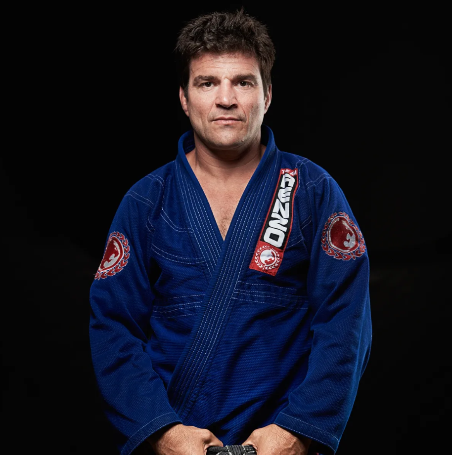 Stan Beck, the experienced and esteemed former owner of the renowned Renzo Gracie of Weston academy, stands confidently in front of attentive students, sharing invaluable insights and techniques during one of his rare and highly anticipated guest training sessions.
