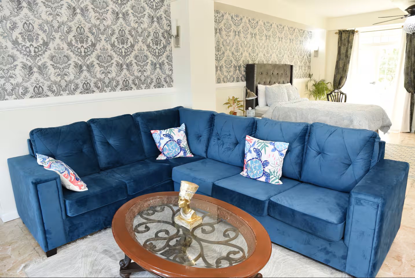 Living Room View with Sectional Couch, TV & Patio Access