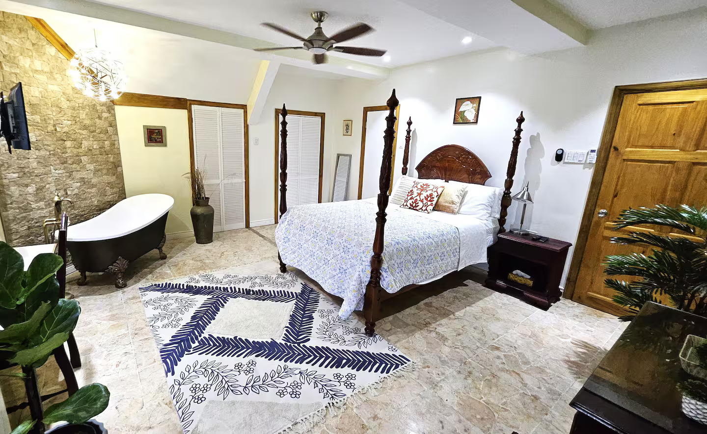 Master Four-Poster Bed with Soaker Tub & Chandelier